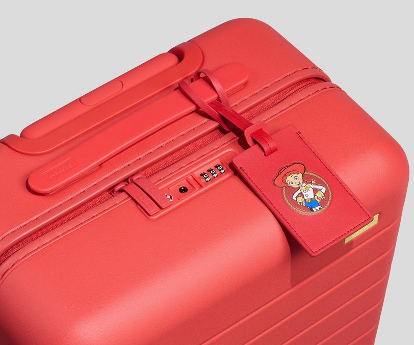 Inspired by the new sheriff in town, this red bag has a matte finish. These slightly smaller suitcases are 22.7" x 15.4" x 9.6". Capacity is 49 L.