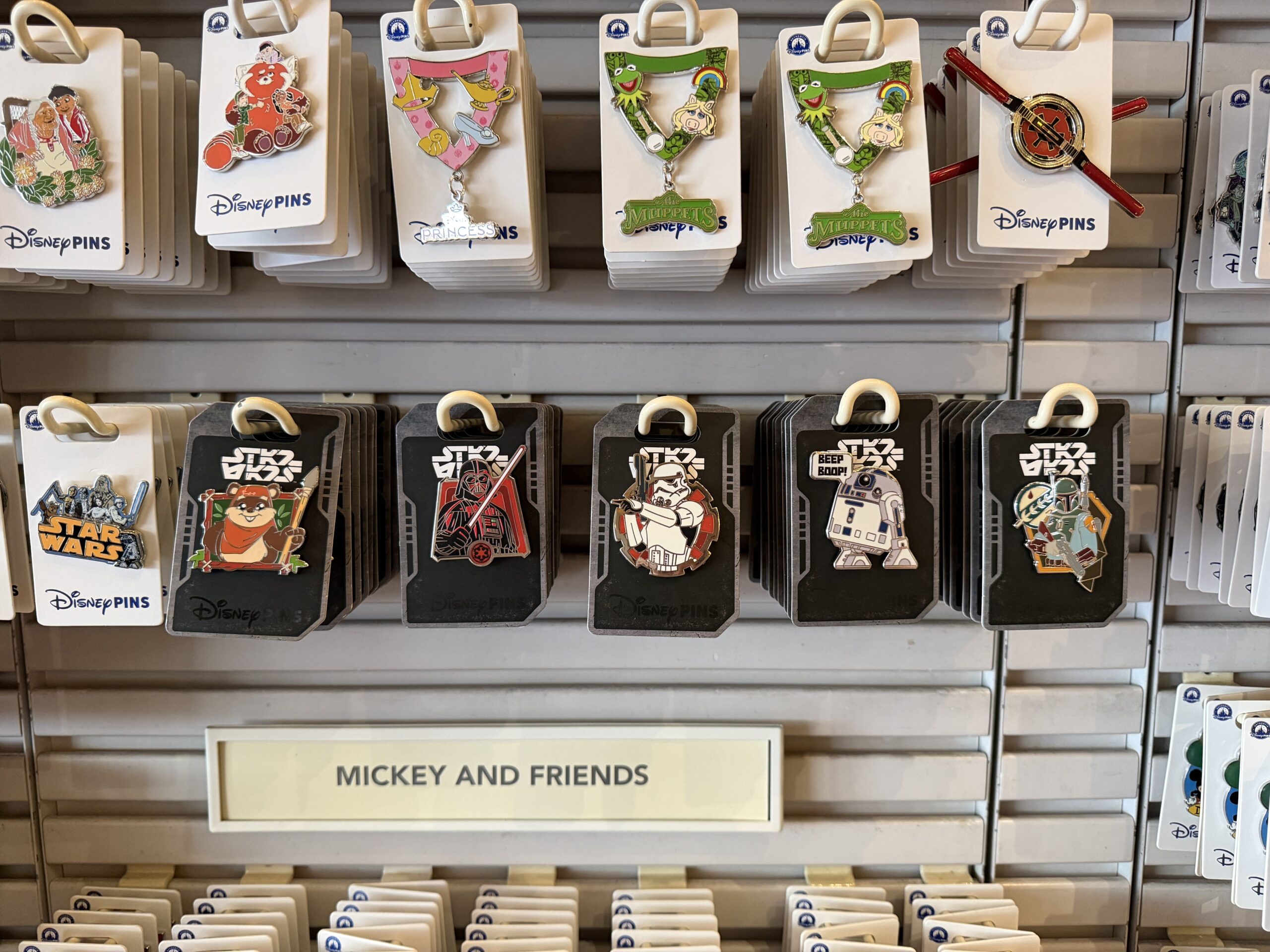 Star Wars pins received new card backings.