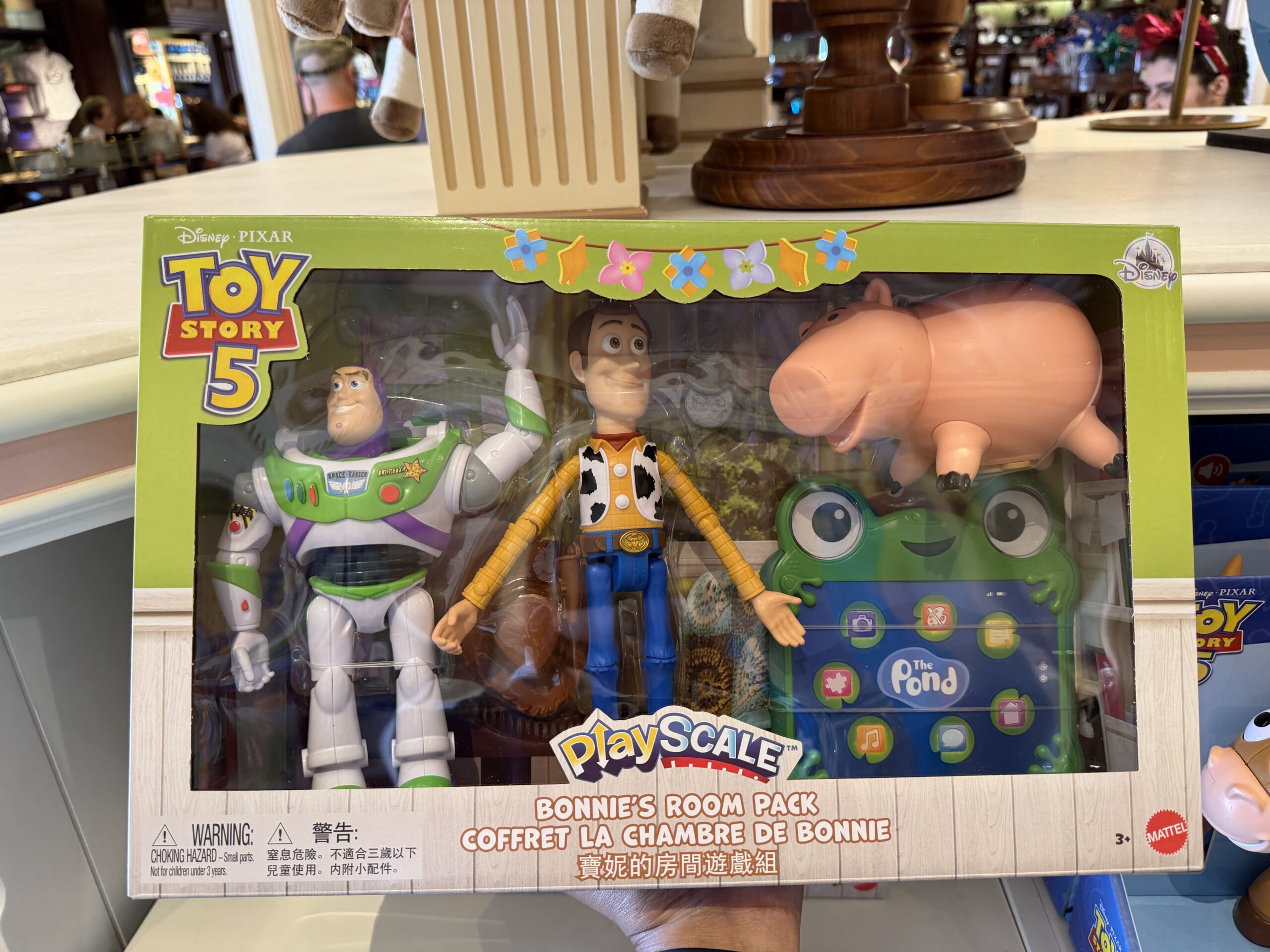 This pack of toys includes figures of Hamm, Woody, Buzz Lightyear, and Lilypad.