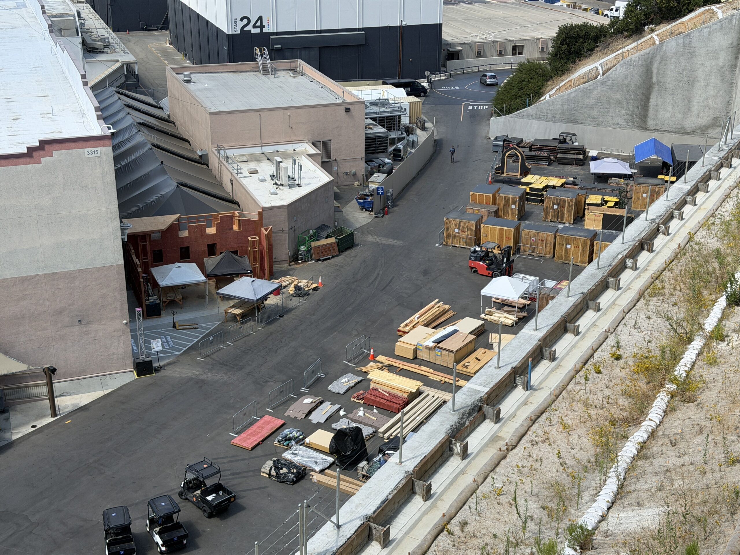 As you can see from the photo above, the props and house are also near Revenge of the Mummy - The Ride. There is a whole line of staged equipment in this area. We cannot say for certain that it is all for HHN, though we presume much of it to be for the upcoming festivities.