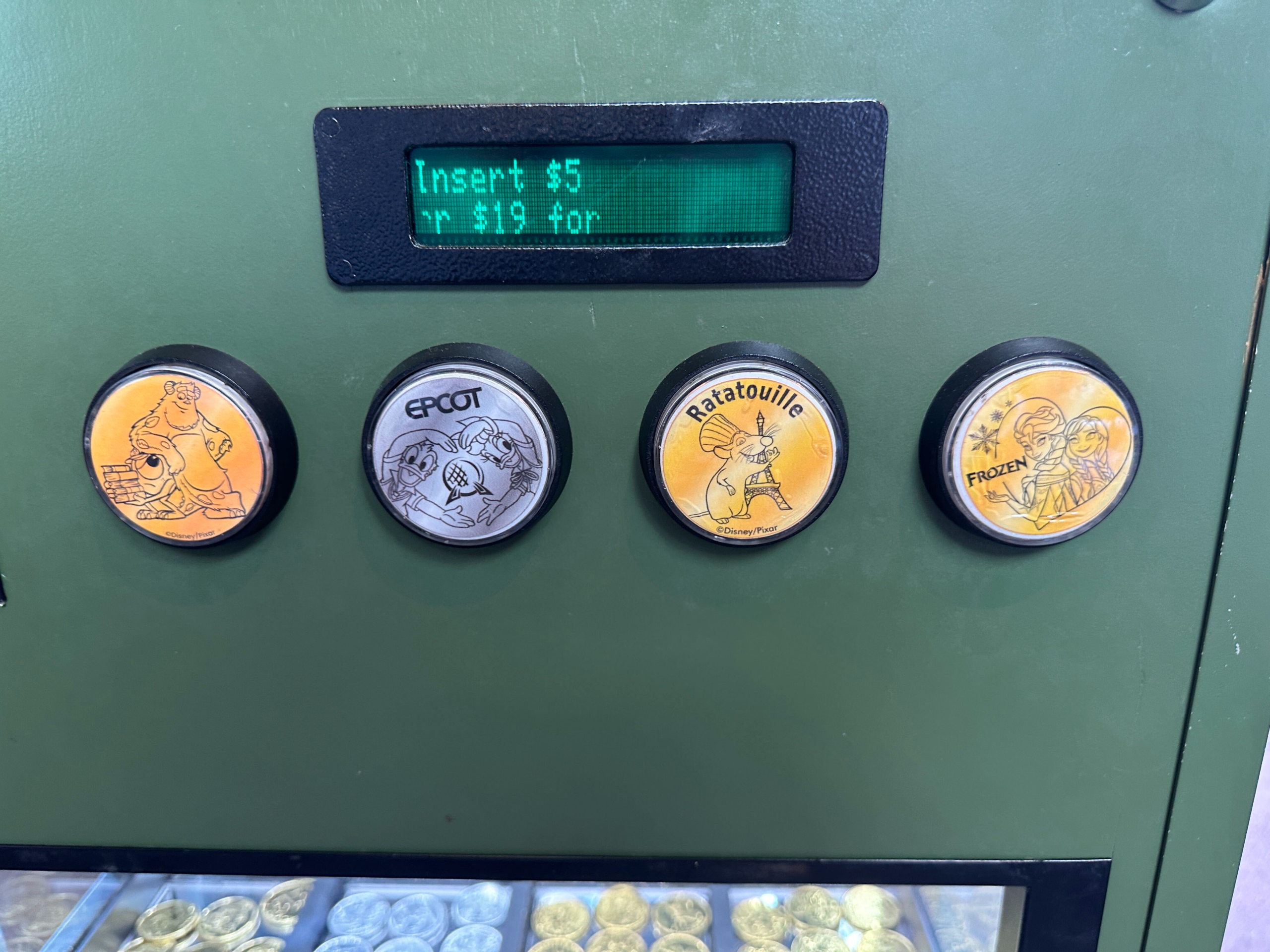 This Monsters, Inc. medallion is one of four options available at this kiosk. The others include Donald and Daisy making a heart around Spaceship Earth, Chef Remy in front of the Eiffel Tower, and Anna and Elsa in a heart.