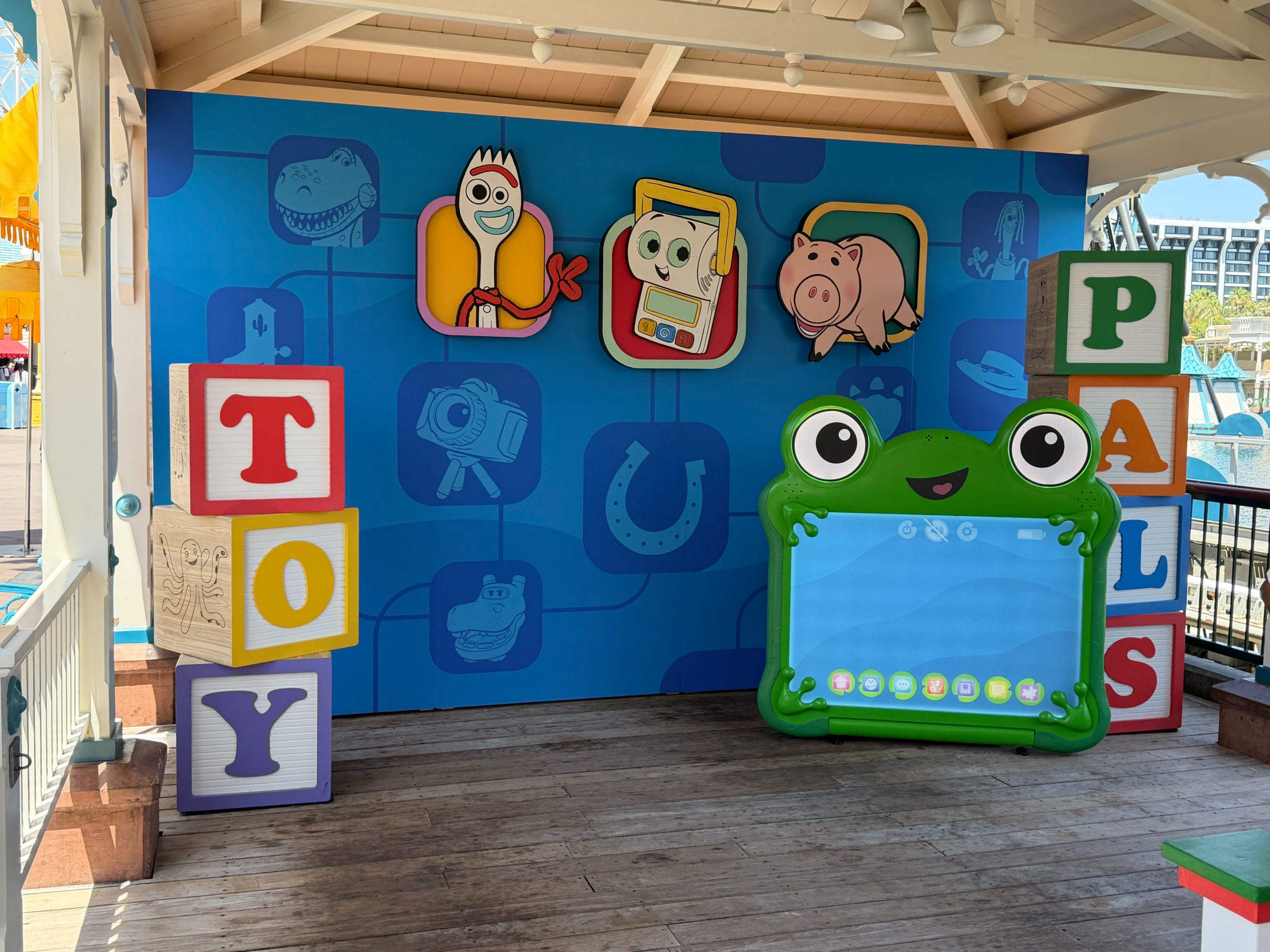 Lilypad, a digital tablet character, makes her appearance for the first time in Toy Story 5. The characters were doing meet-and-greets with guests at Pixar Pier in Disney California Adventure.