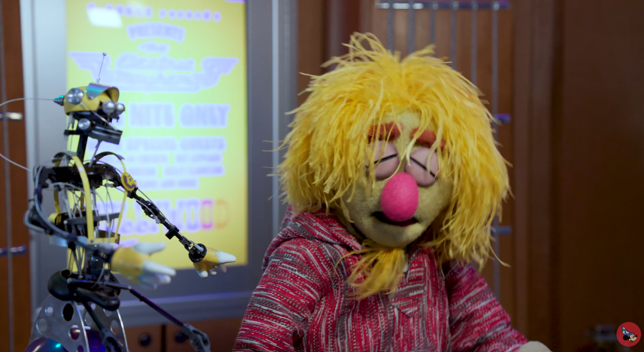 Tom Morrow 2.0 robot joined by Muppets Lips.