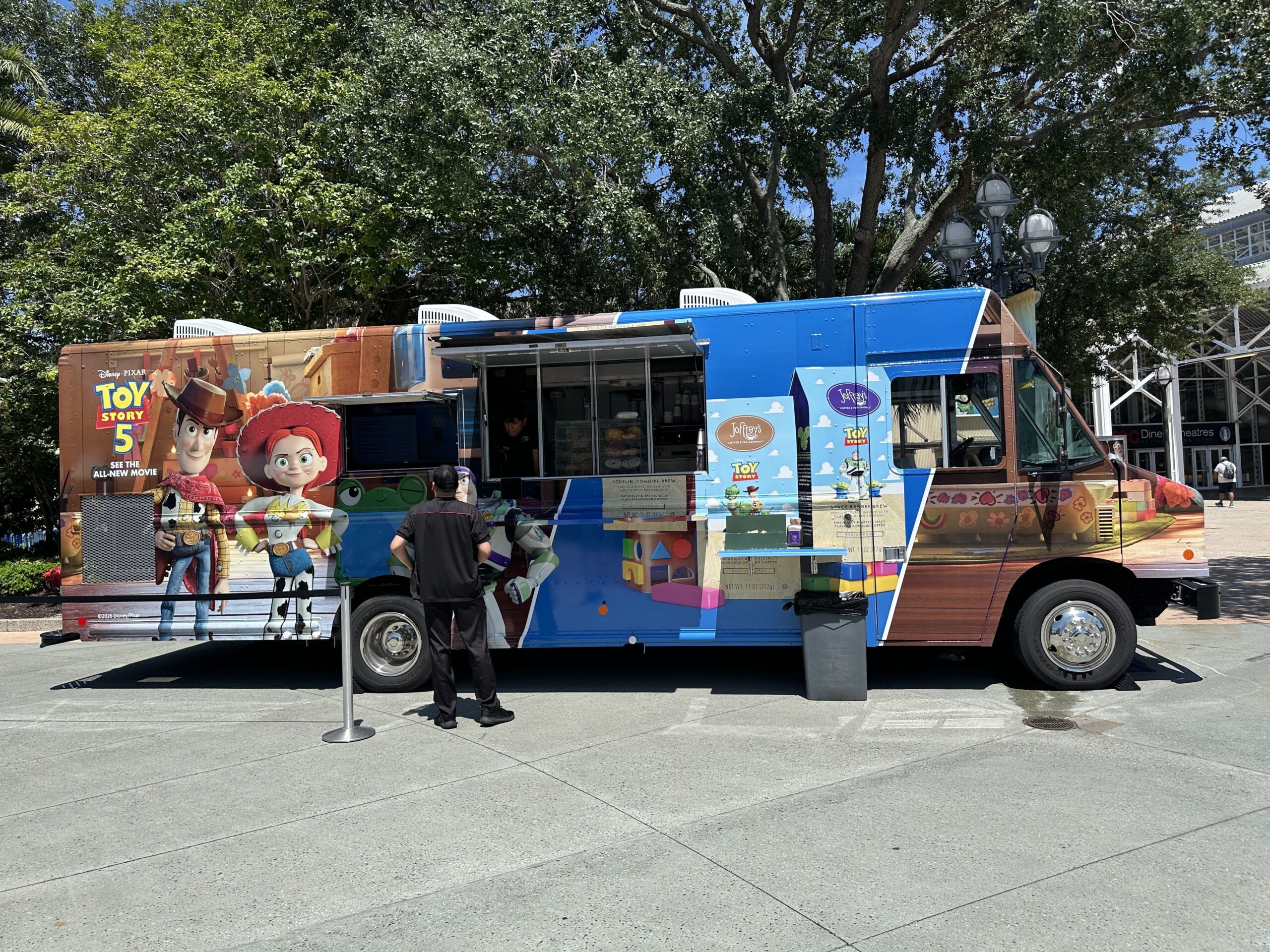 The truck showcases Jessie and Woody in their Toy Story 5 outfits as well as Toy Story-themed Joffrey's coffee products. We spotted the truck, fittingly, over by the AMC Theatre on the West Side of Disney Springs.