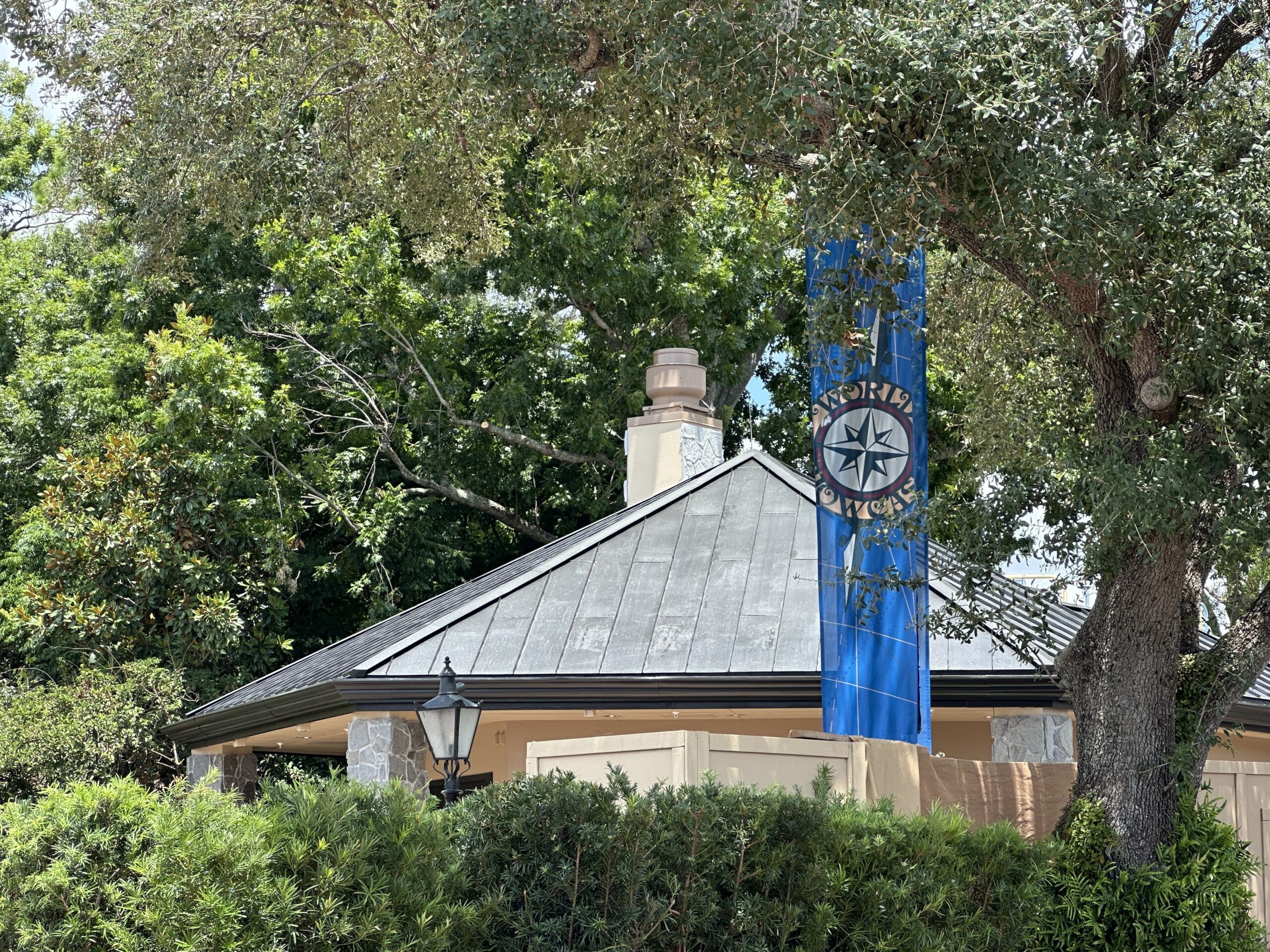 It appears that the chimney is receiving the same stone work texturing as the kiosk's pillars. As you can see above, there is still a plain tan-painted side of the chimney facing left from the perspective of the photo.