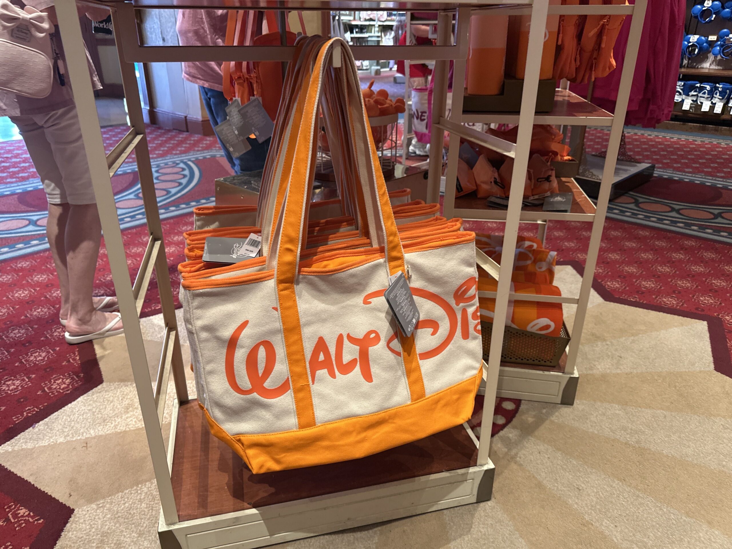 While custom embroidery is available at Magic Kingdom, they are no longer doing this work on the large totes from the Logo Mania collection. Other items are still eligible, however.