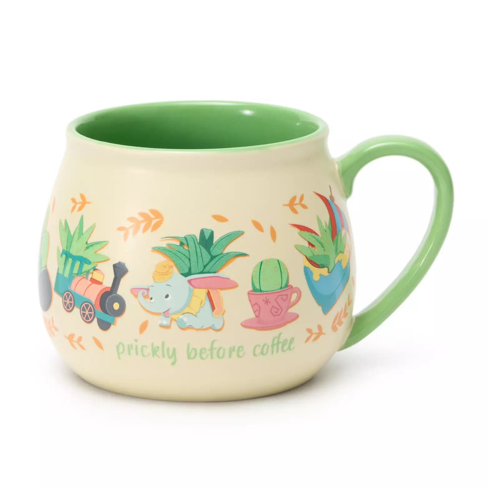 Ivory with a light green handle, this mug shows all kinds of pokey plants and iconography from the Disney Parks, such as Dumbo the Flying Elephant or a Jungle Cruise boat. It reads “Prickly before coffee” on the back.