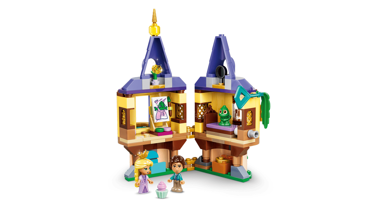 When opened, the playset reveals the inner workings of the tower. We see Rapunzel's art studio as well as her bedroom. Even her frying pan is tucked away just beneath the roof gables.