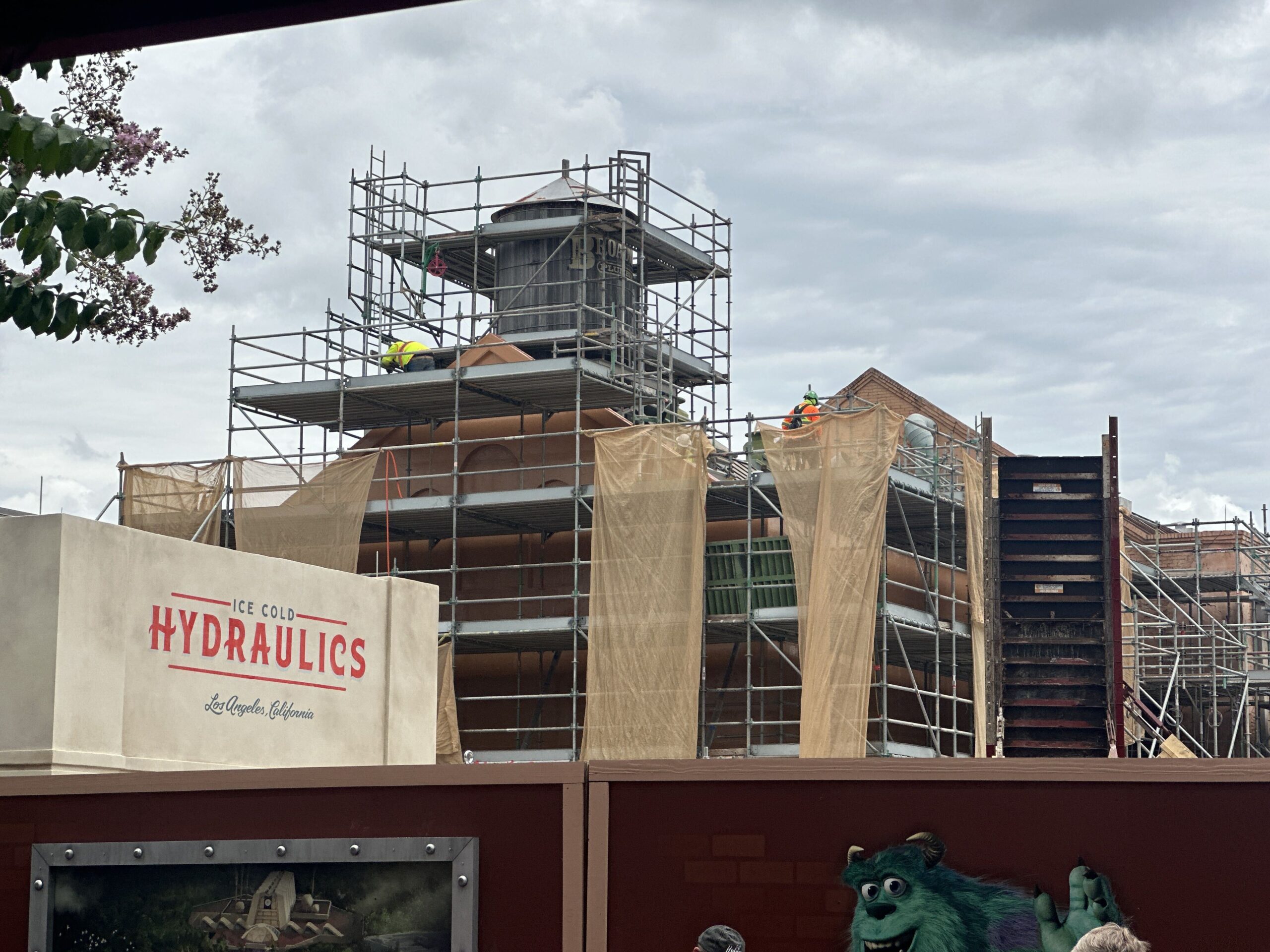 The Gonzo's Royal Flush building has new paneling across its front and sides. This facade was also largely stripped, and new insulation was installed earlier this month. Round details are visible on the new paneling that weren't part of the old facade, pictured below.