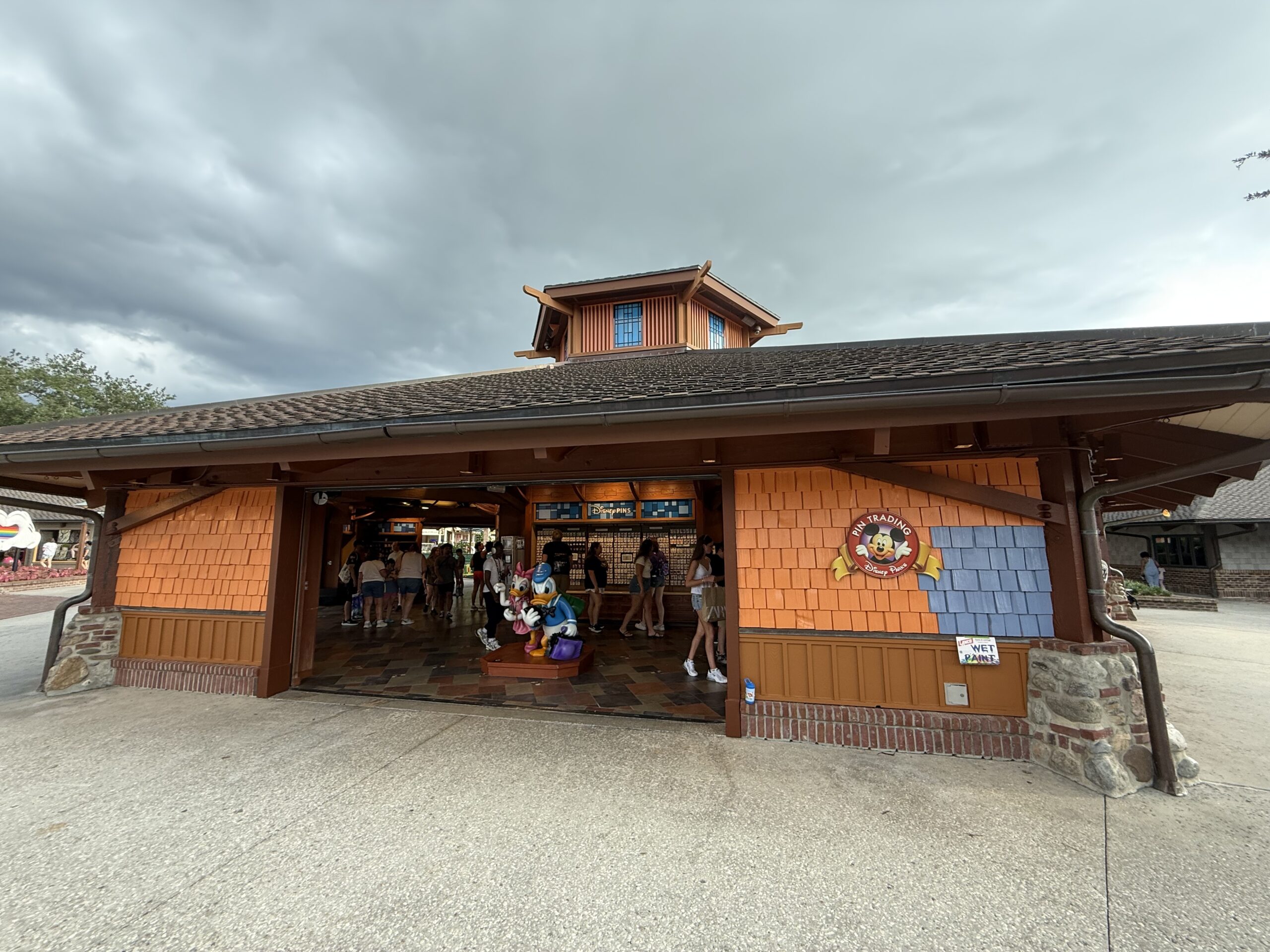 Pin Traders in Disney Springs is currently in the progress of being painted from an orange-brown to blue.