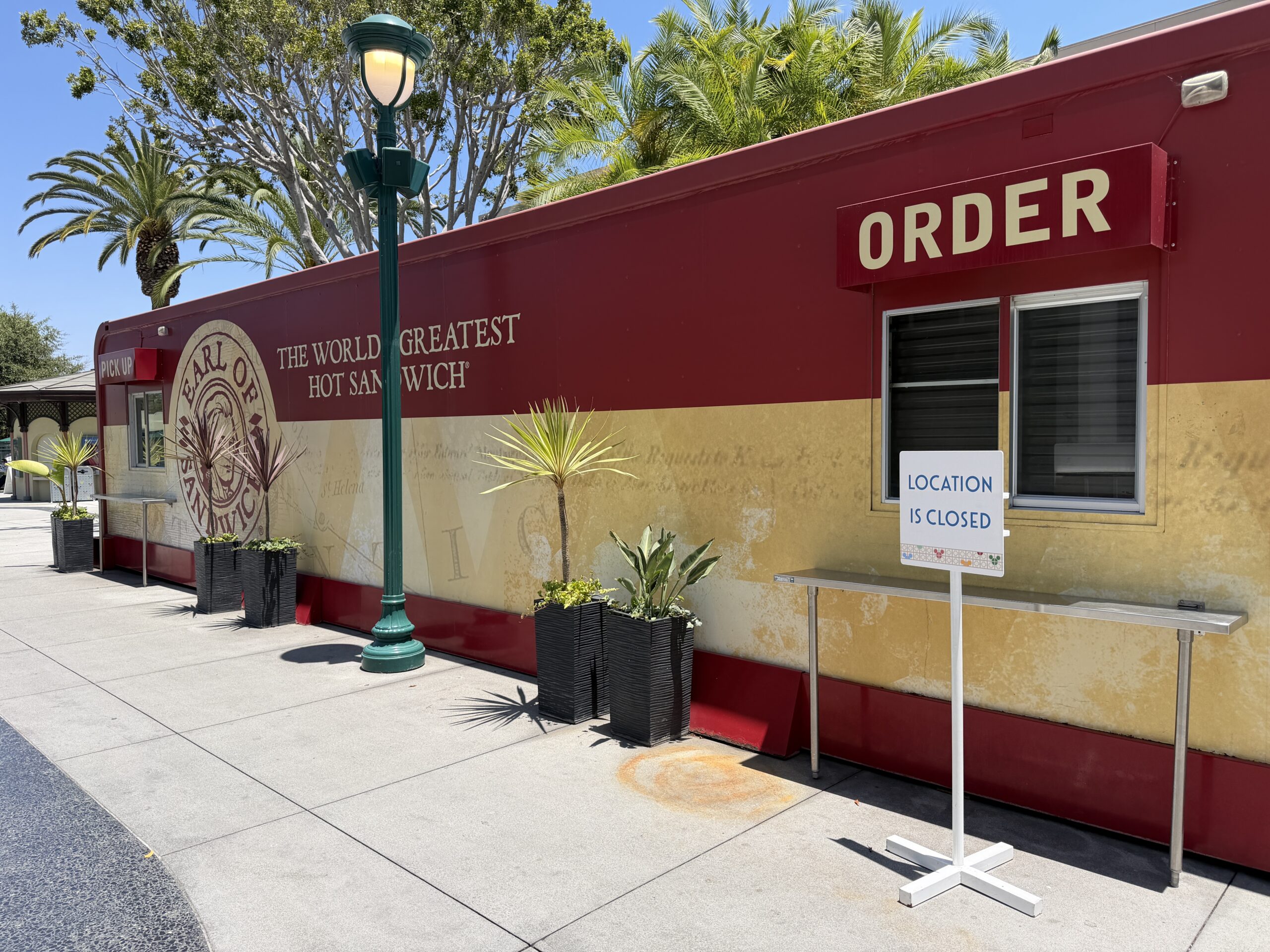 The satellite location near Star Wars Trading Post now has a "Location is Closed" sign in front of it. All seating has been removed from the area.