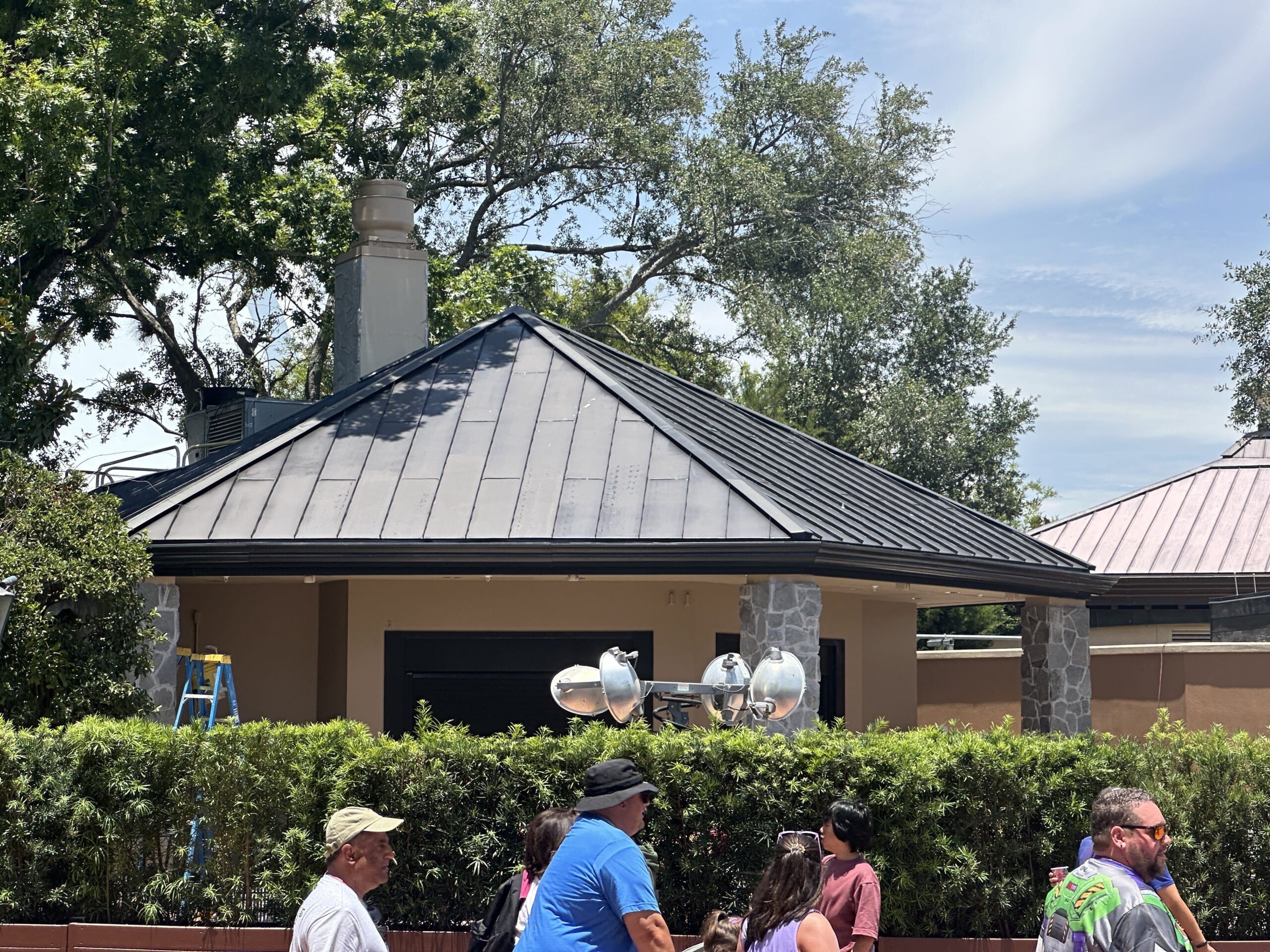 Now that we have an opening date and menu reveal, some construction walls have come down at La Poutinerie in EPCOT. They have been replaced with rolling planters.