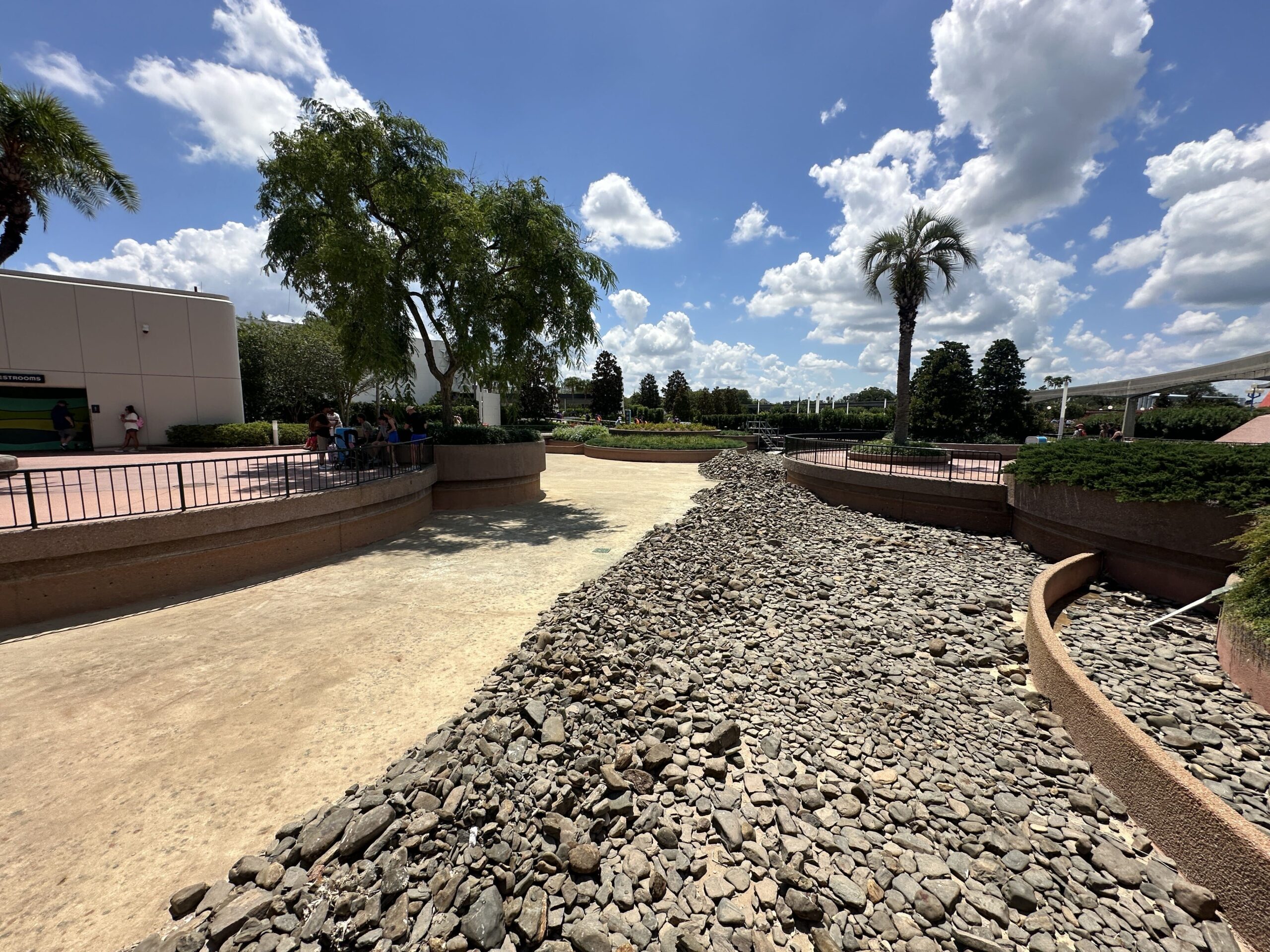 Disney has removed the coins from a World Celebration reflecting pool that was recently drained.