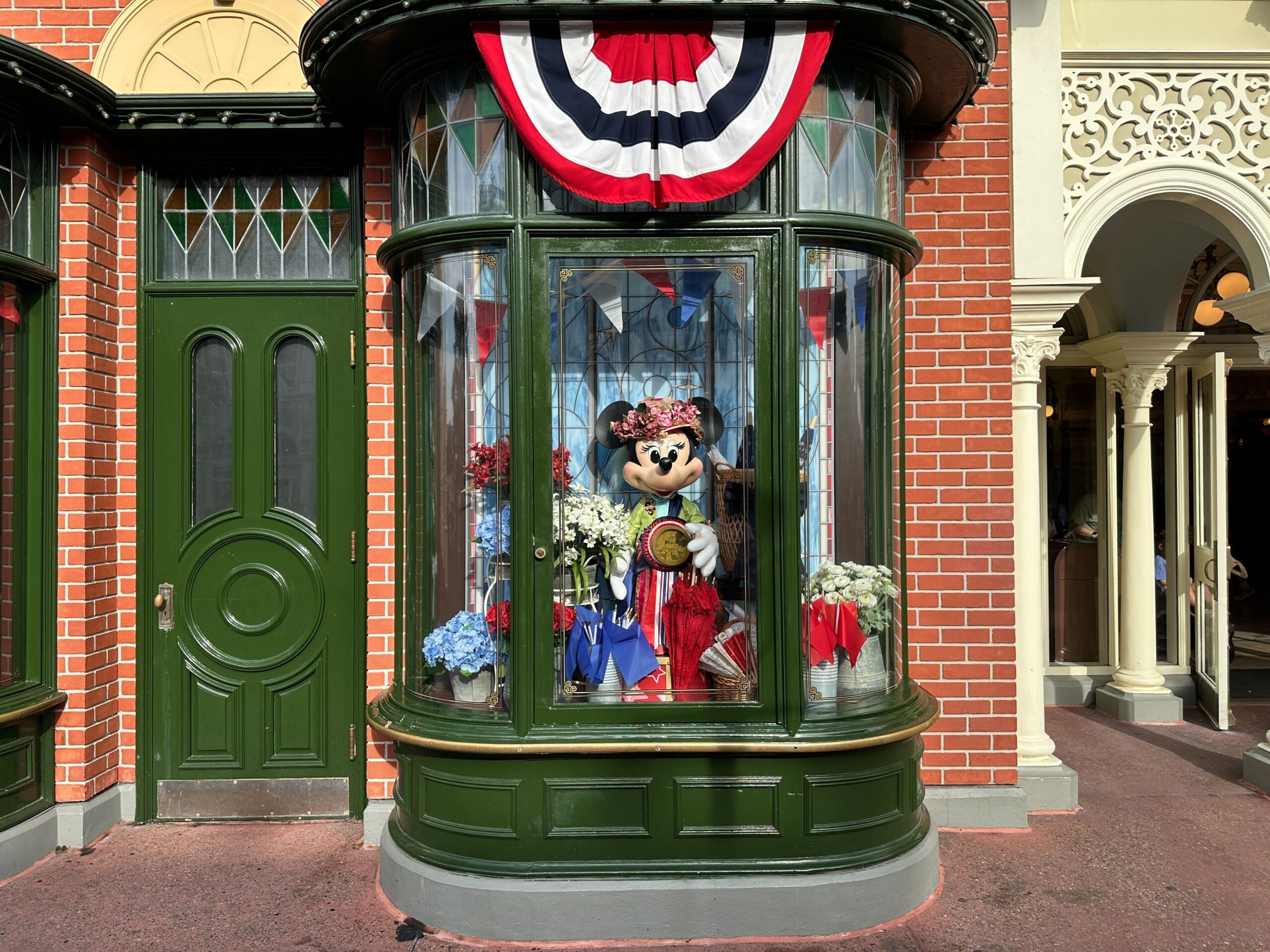 Patriotic Main Street Window Displays Featuring Mickey and Minnie at Magic Kingdom