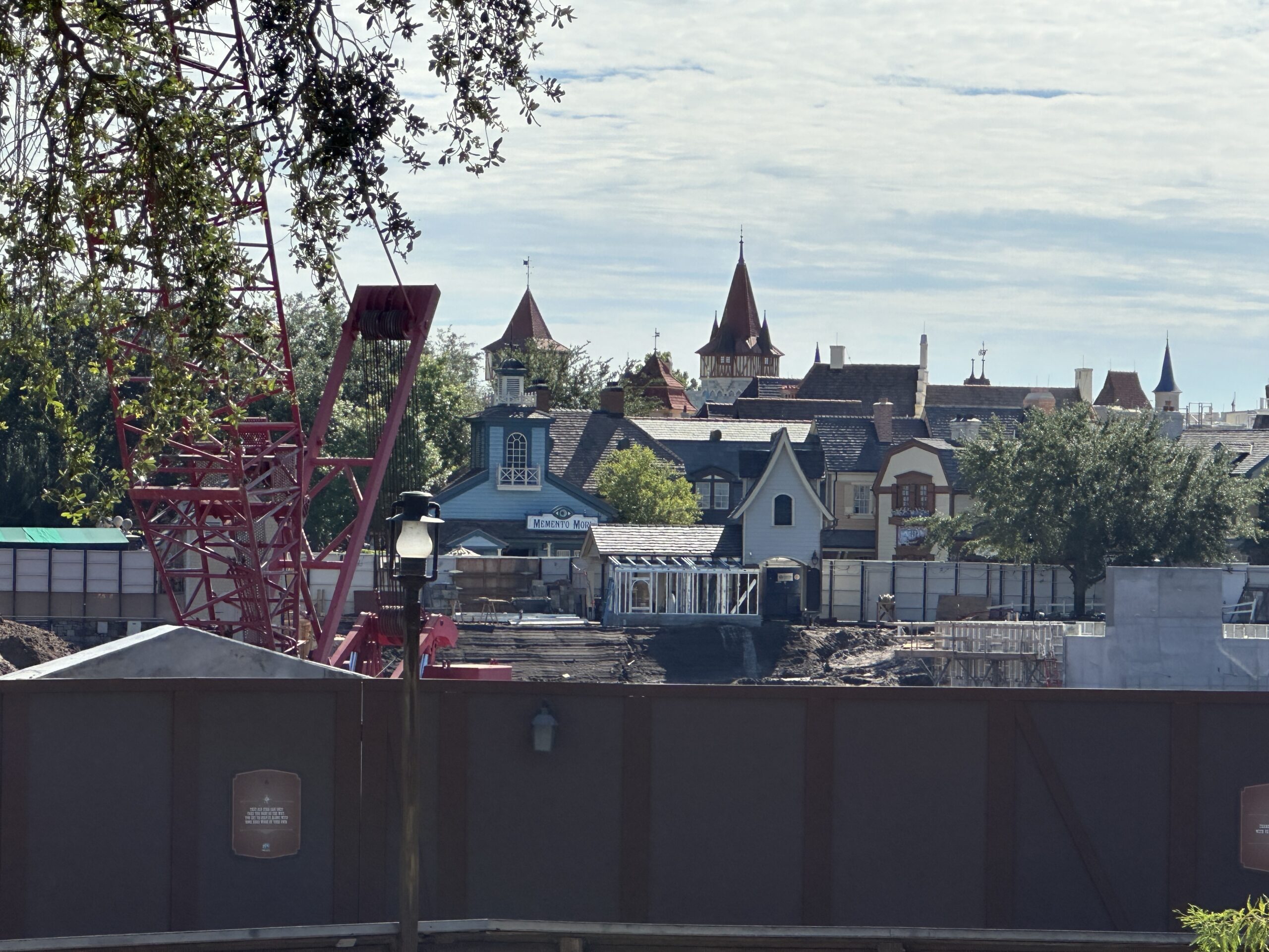 A building near The Haunted Mansion at Magic Kingdom is getting an extension, possibly related to construction of Piston Peak National Park.