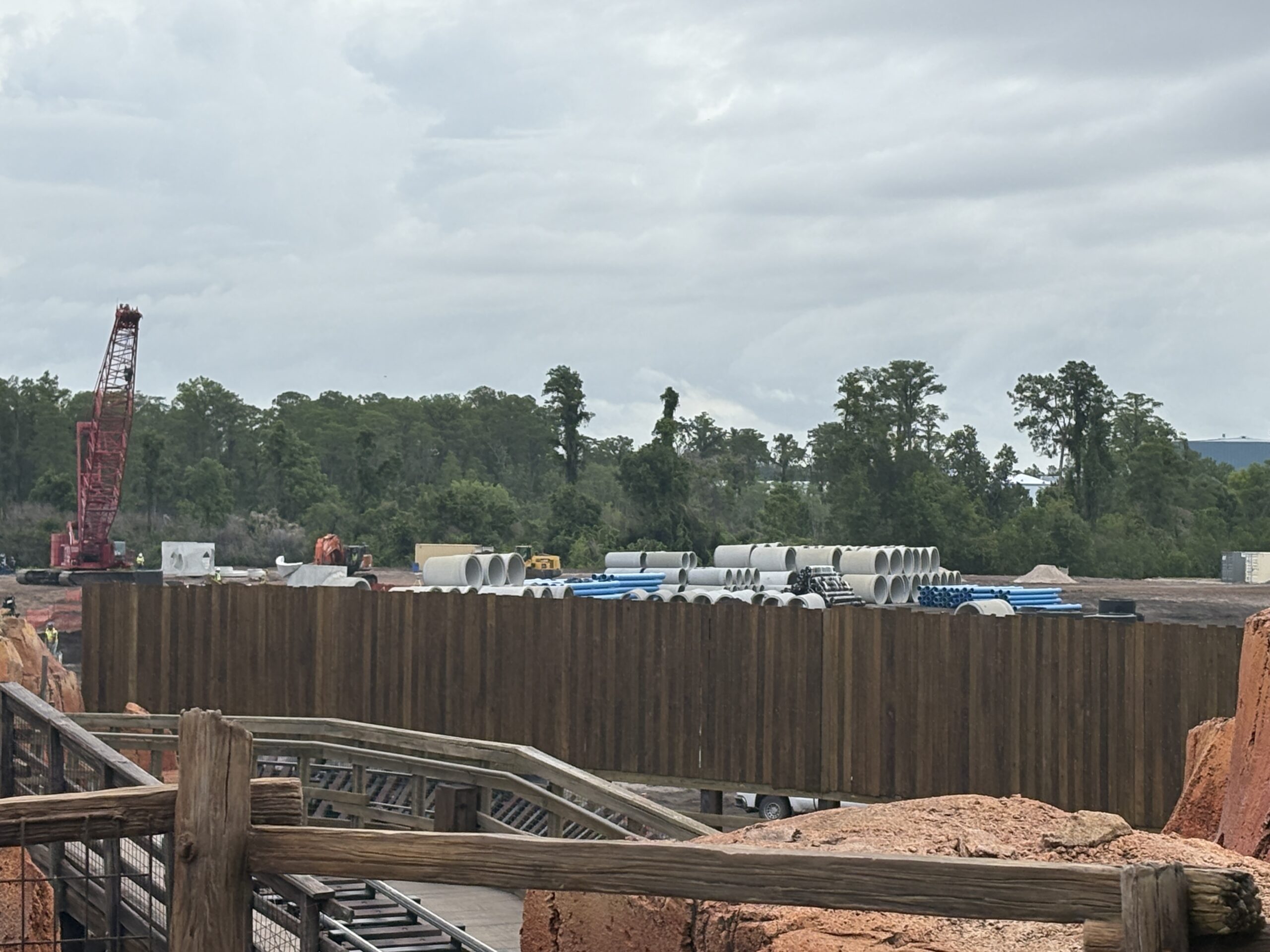 Pipes have been installed in the ground throughout the Cars-themed Piston Peak National Park, currently under construction at Magic Kingdom. Work also continues on the retaining wall separating the new area from the rest of Frontierland.