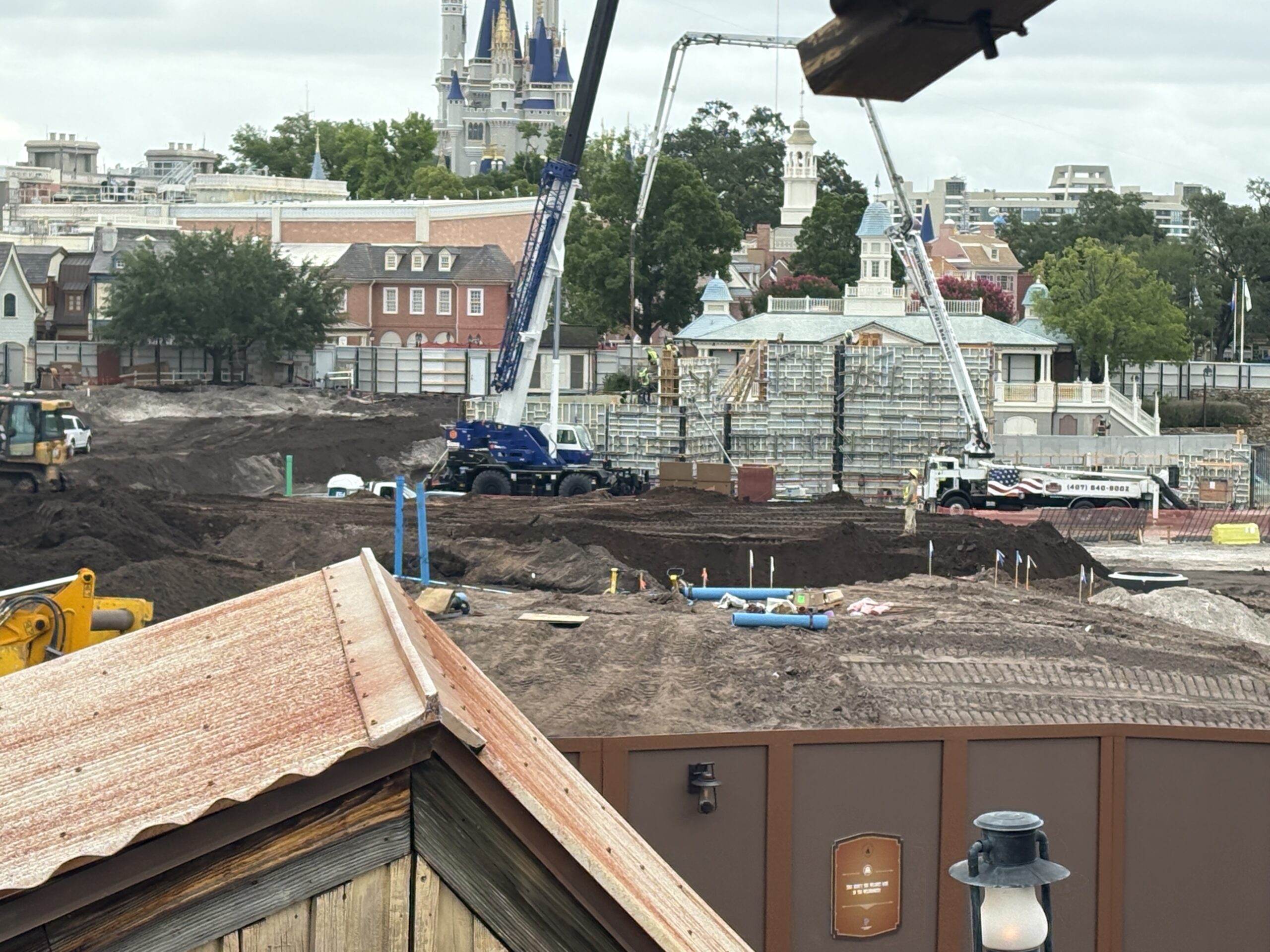 Pipes have been installed in the ground throughout the Cars-themed Piston Peak National Park, currently under construction at Magic Kingdom. Work also continues on the retaining wall separating the new area from the rest of Frontierland.