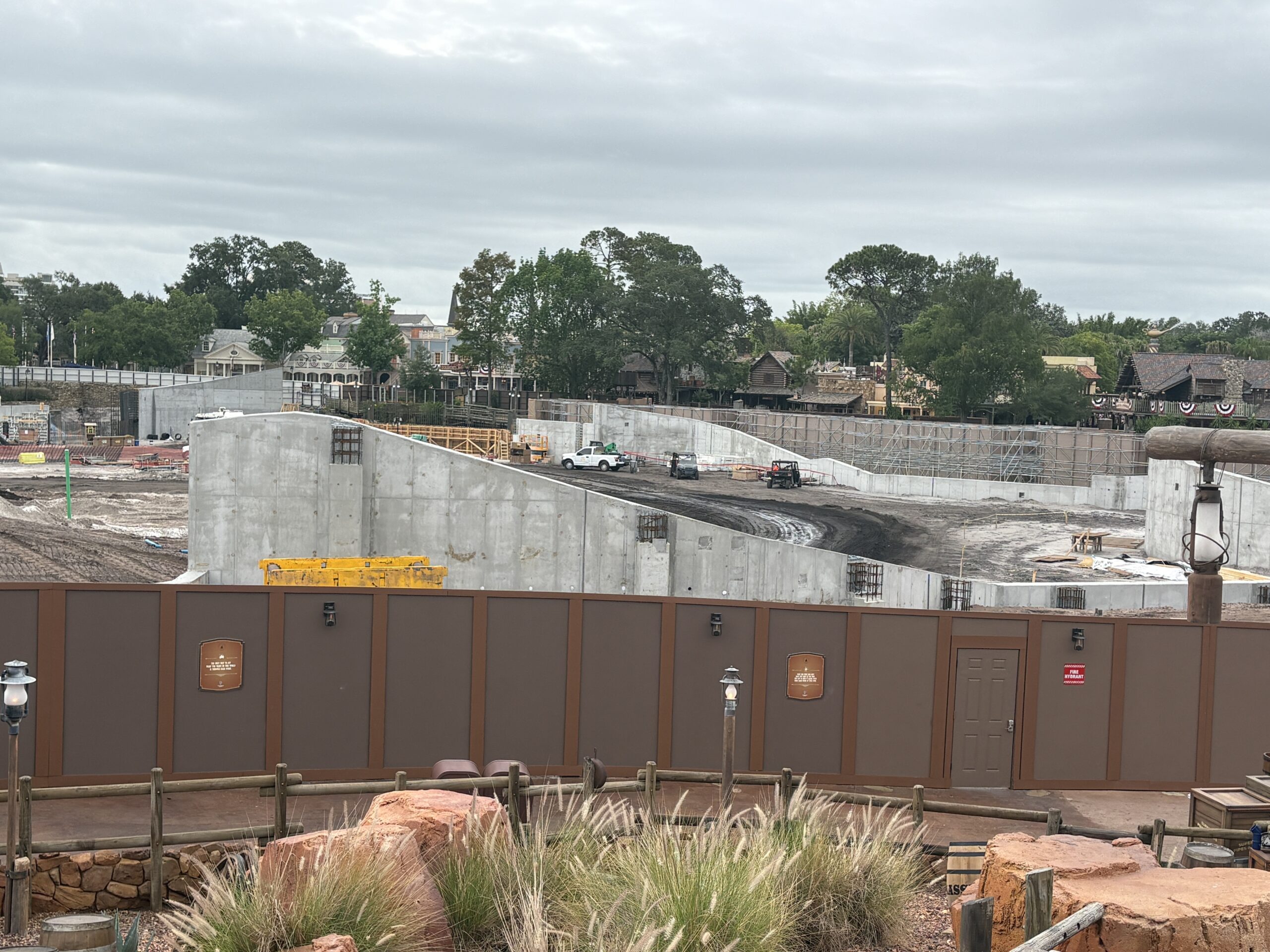 Pipes have been installed in the ground throughout the Cars-themed Piston Peak National Park, currently under construction at Magic Kingdom. Work also continues on the retaining wall separating the new area from the rest of Frontierland.
