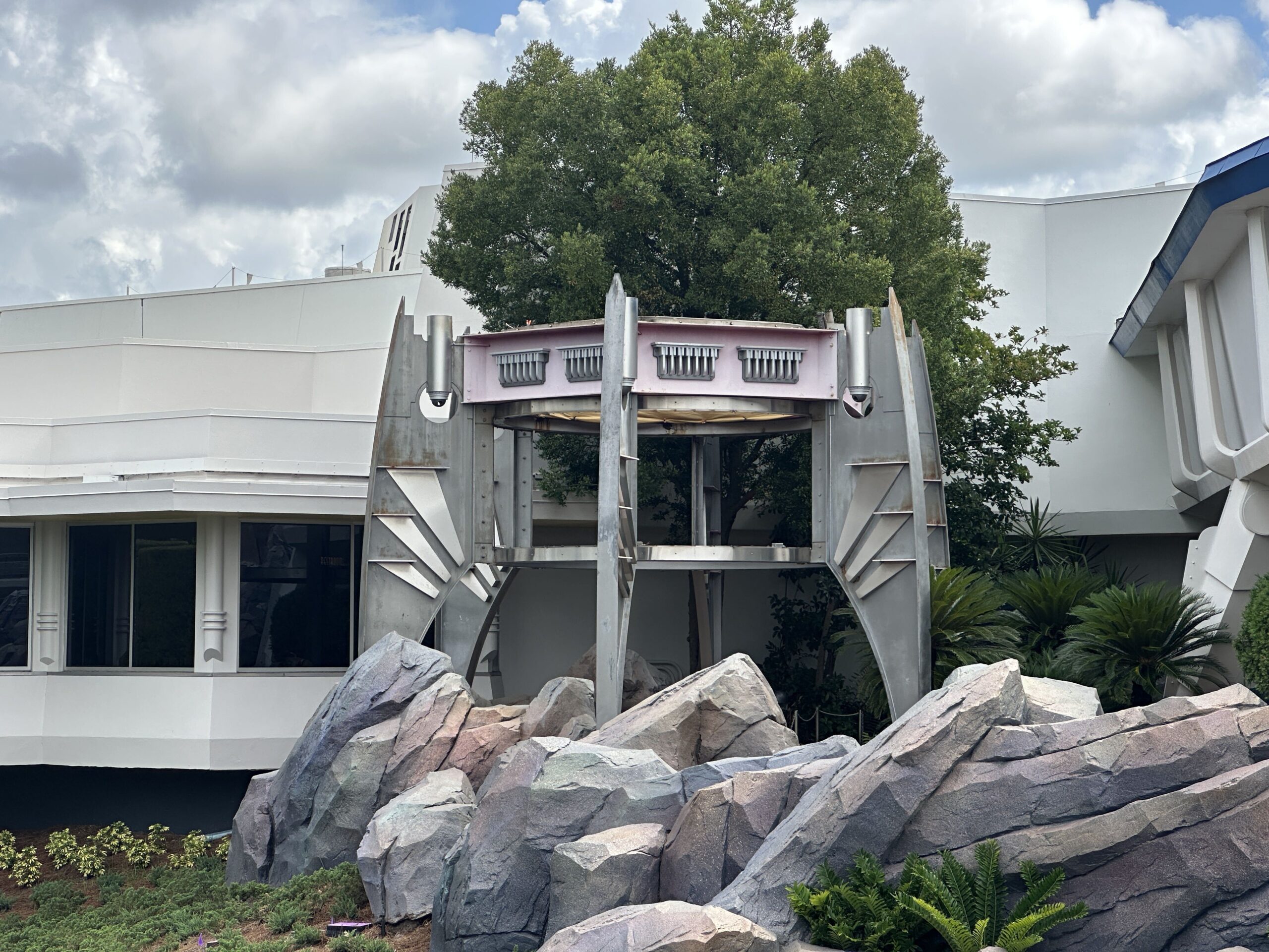 The roof has been removed from the large spaceship-like tower near the entrance to Tomorrowland at Magic Kingdom.