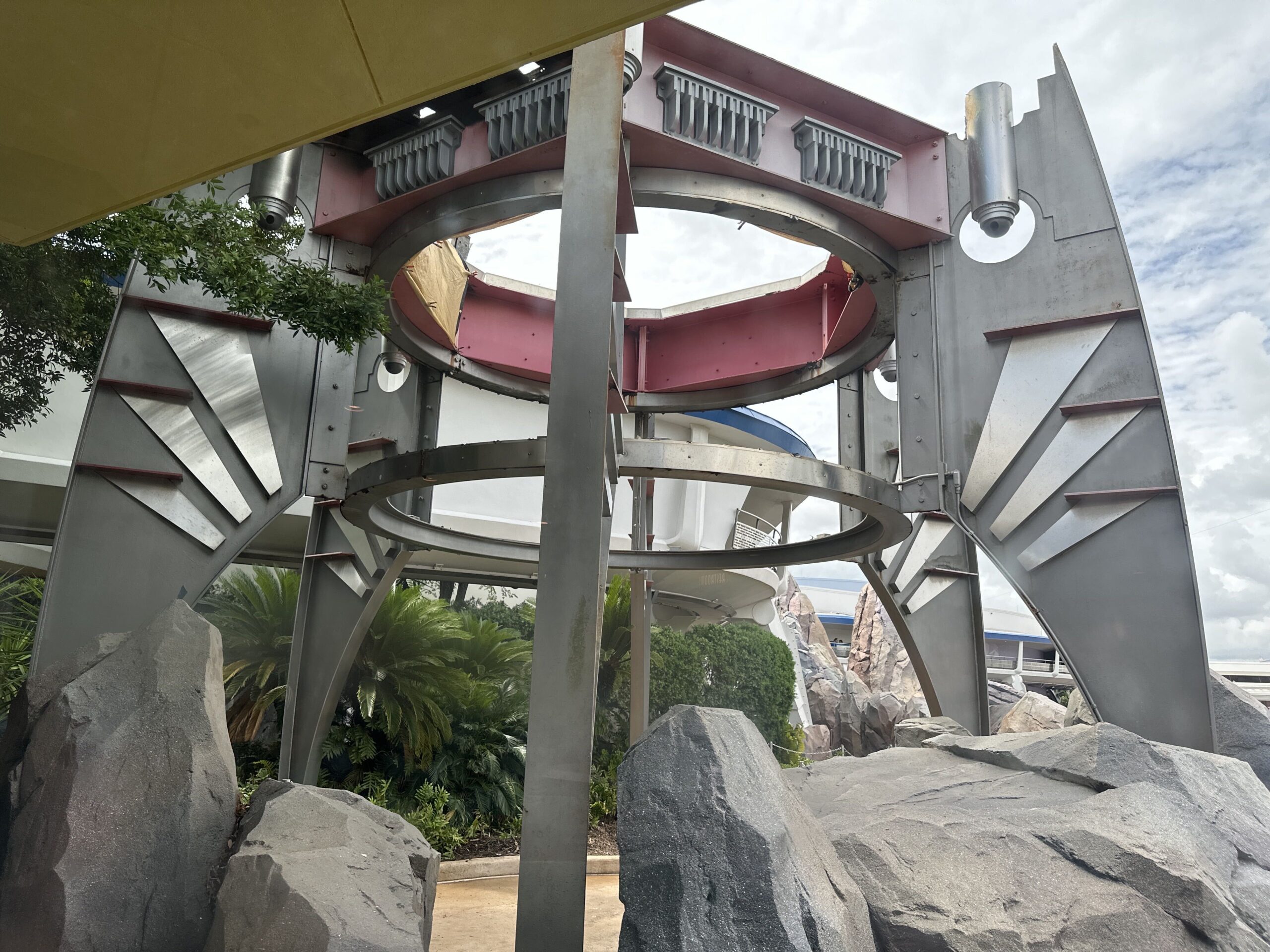 The roof has been removed from the large spaceship-like tower near the entrance to Tomorrowland at Magic Kingdom.