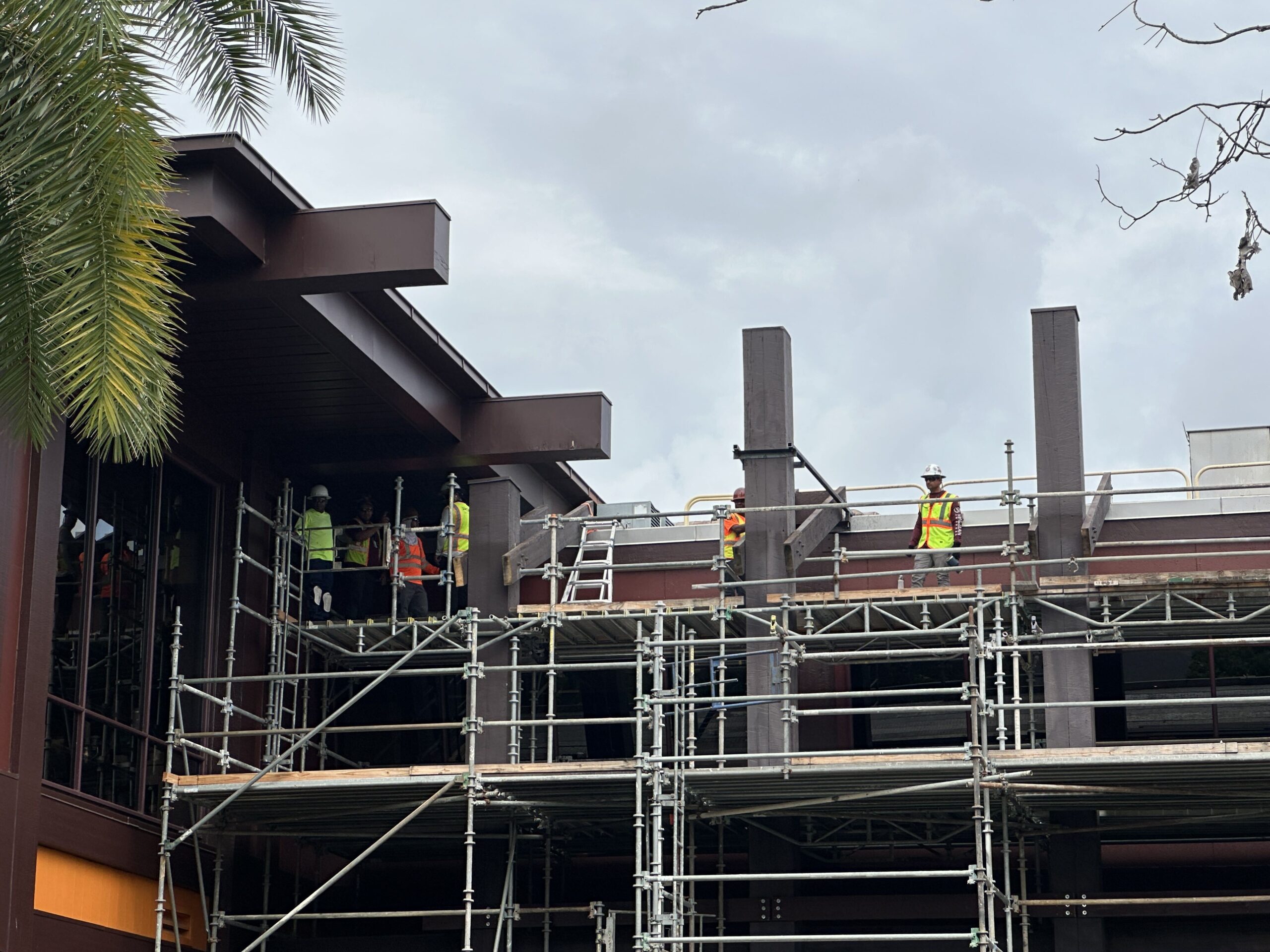 Crews continue to work on the Great Ceremonial House — the resort's lobby. A few weeks ago, the exterior vertical beams were repainted. Other elements have been replaced. On Wednesday, we saw crew members working where two walls meet.