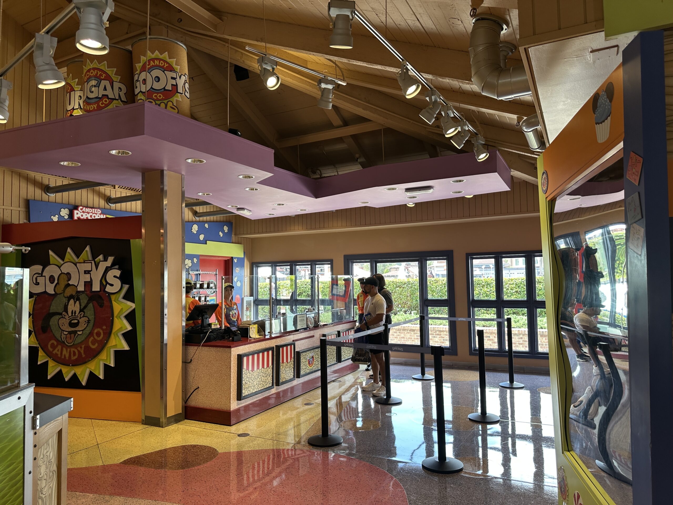 Similar to the popcorn options from the Kernel Kitchen in Main Street Confectionery at Magic Kingdom, guests can add all kinds of toppings to regular and flavored popcorn at Goofy's Candy Company.