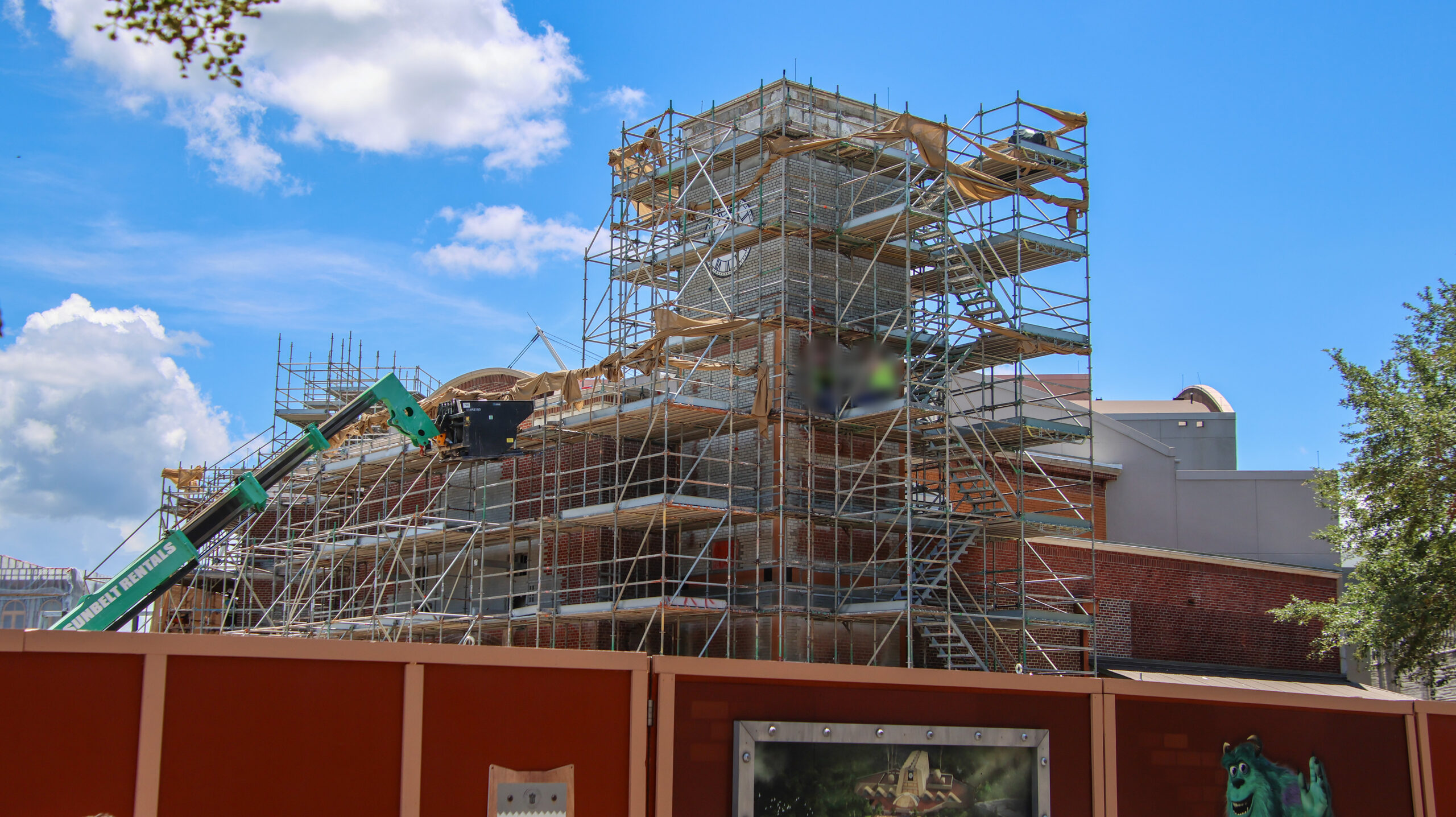 New close-up views reveal the monster-inspired details transforming buildings in the future Monstropolis land at Walt Disney World.