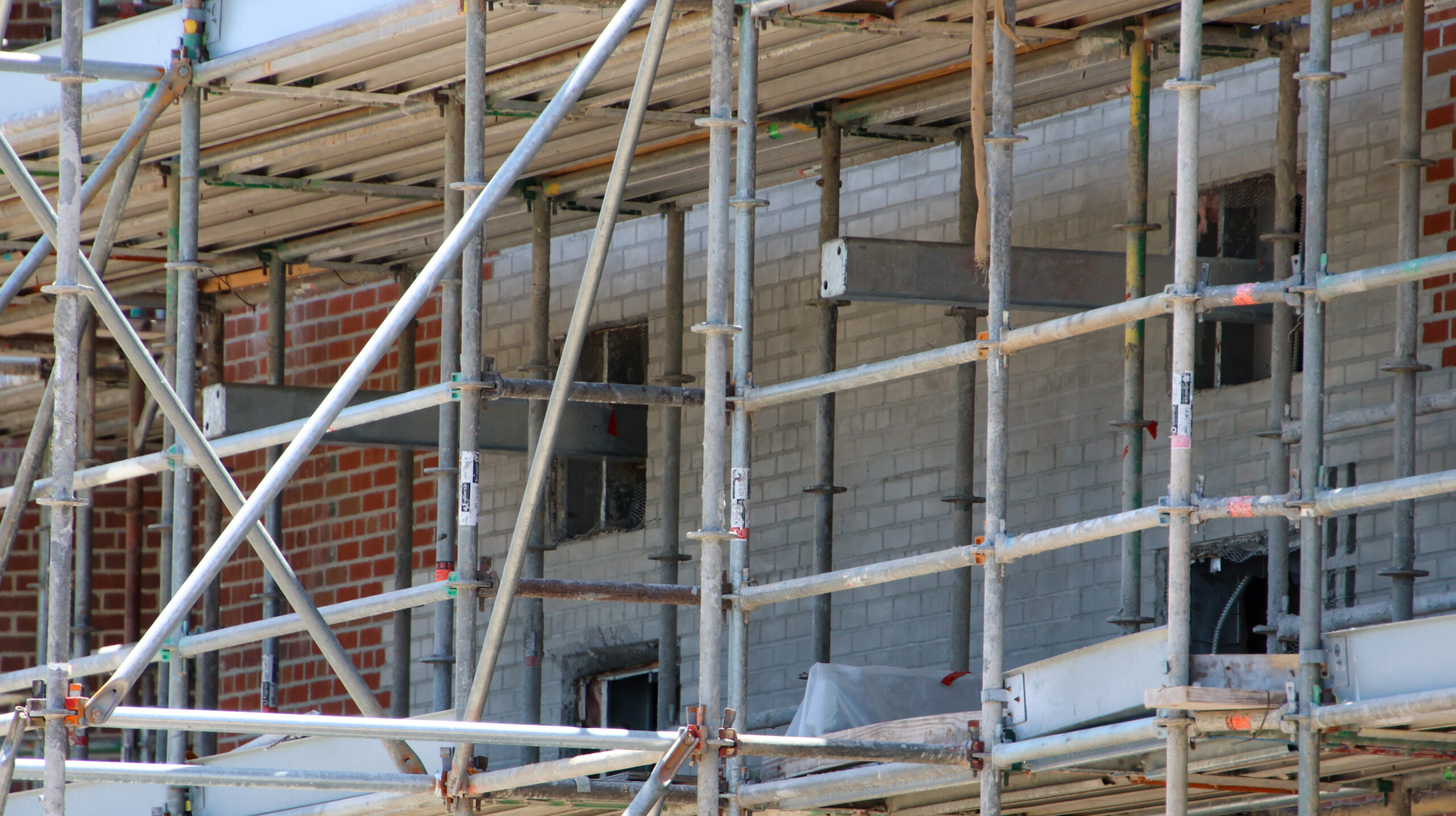 New close-up views reveal the monster-inspired details transforming buildings in the future Monstropolis land at Walt Disney World.