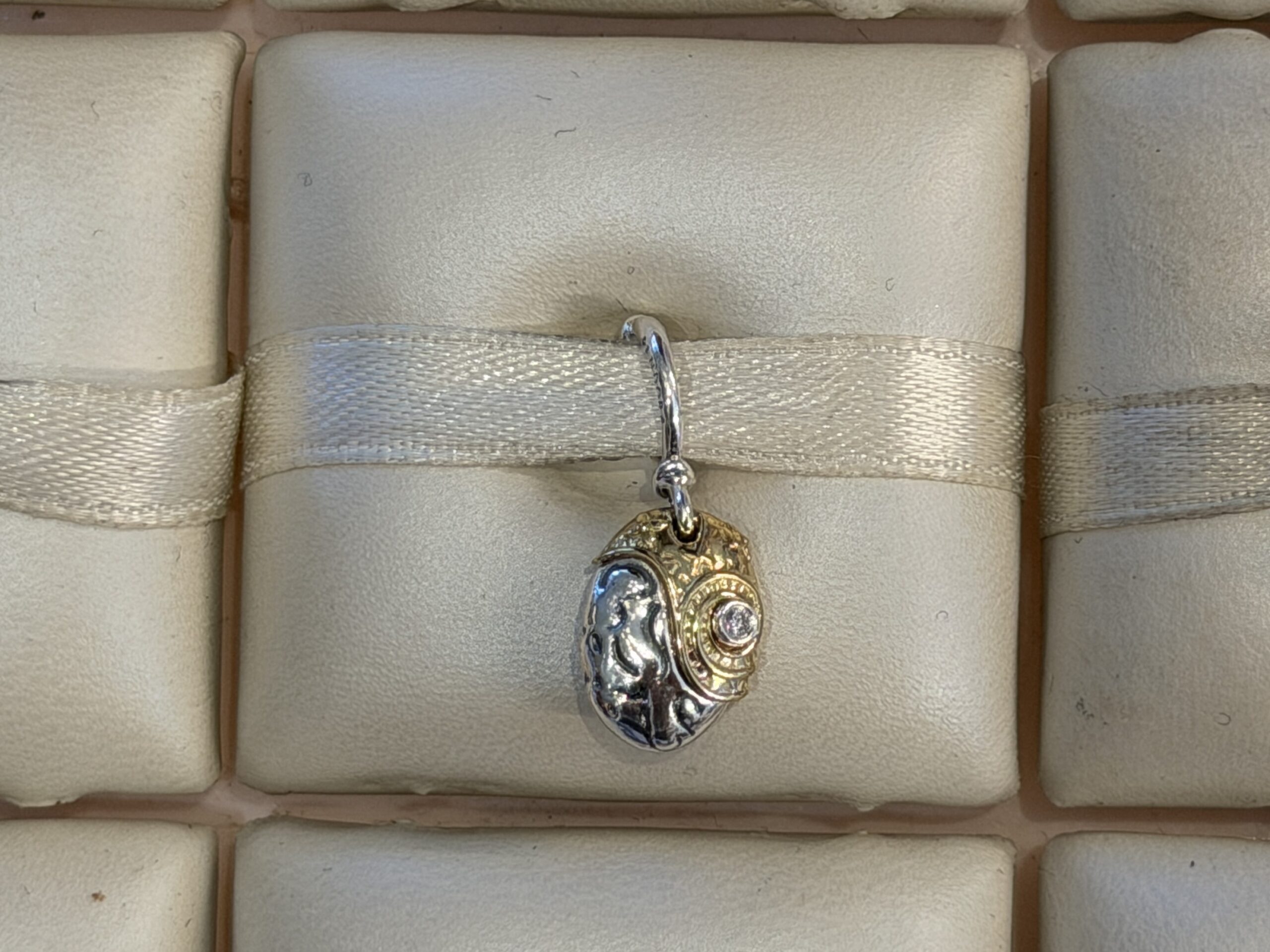 A Moana Heart of Te Fiti dangle charm by Pandora has arrived at Disneyland. It's also available online.