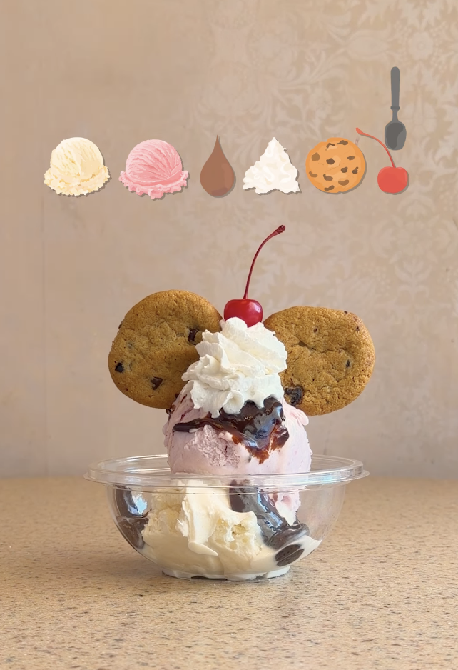 In the video, a spoon graphic goes item to item as each magically appears in the dish below. By the end of the video, we see a sundae with Mickey ears. Disney Eats' video caption reads: "Sprinkling a little magic into every layer ✨🍦 Happy National Ice Cream Day!"