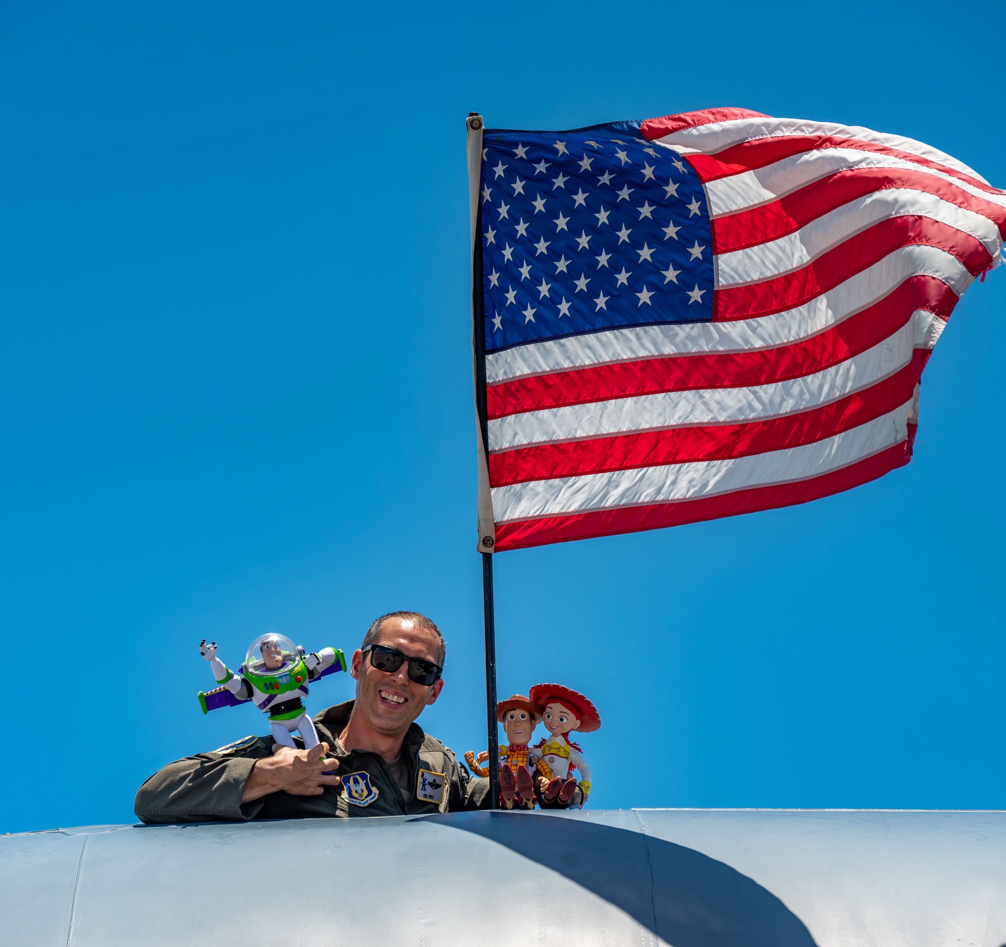 Disney Parks shared a new behind-the-scenes look at the U.S. Air Force Reserve flyover that took place over Walt Disney World for Independence Day, with a few familiar toys joining the flight crew.