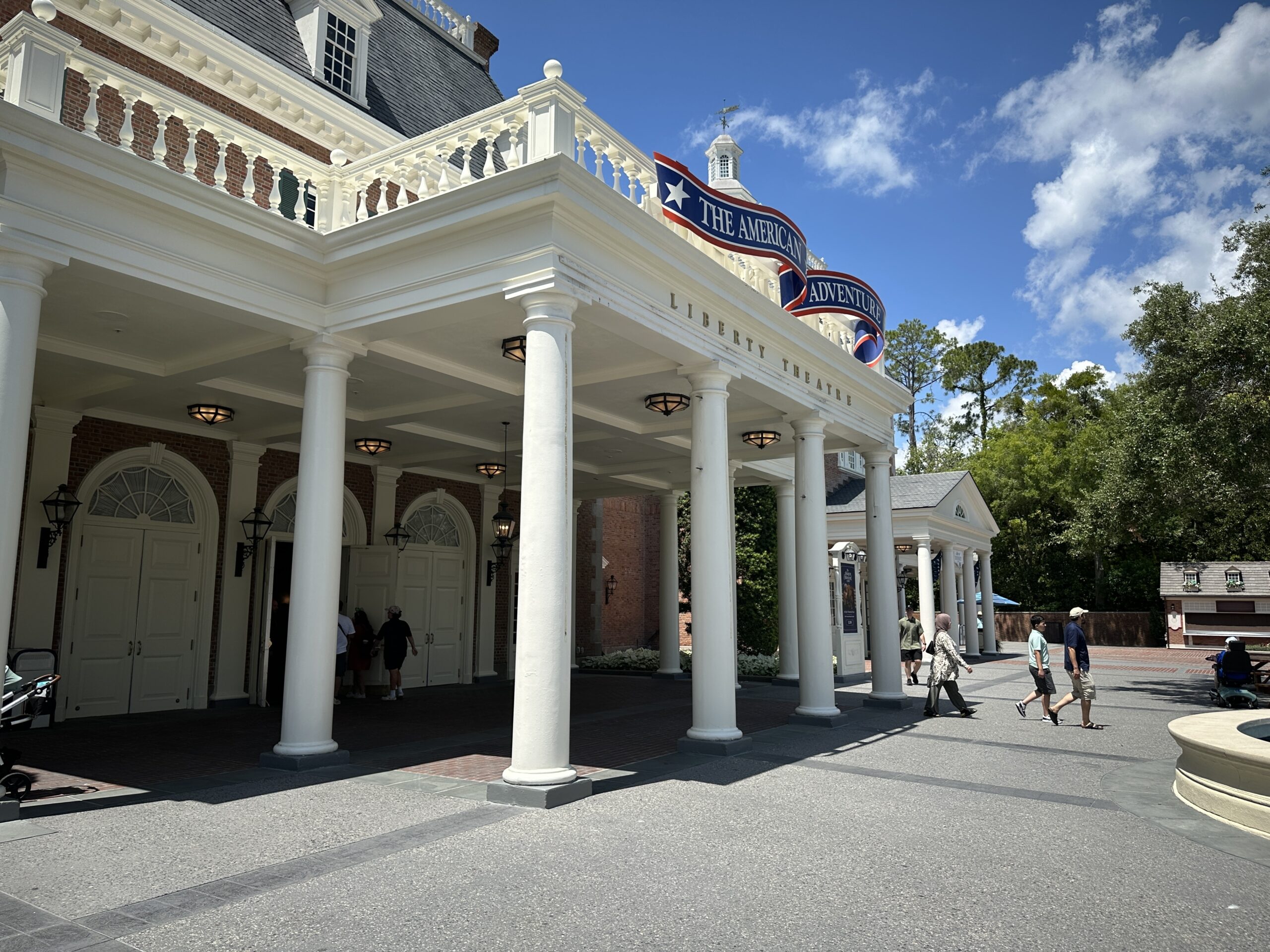 Up near the top of the columns where the sign brackets are, there is significant damage left behind after the show signs were removed.