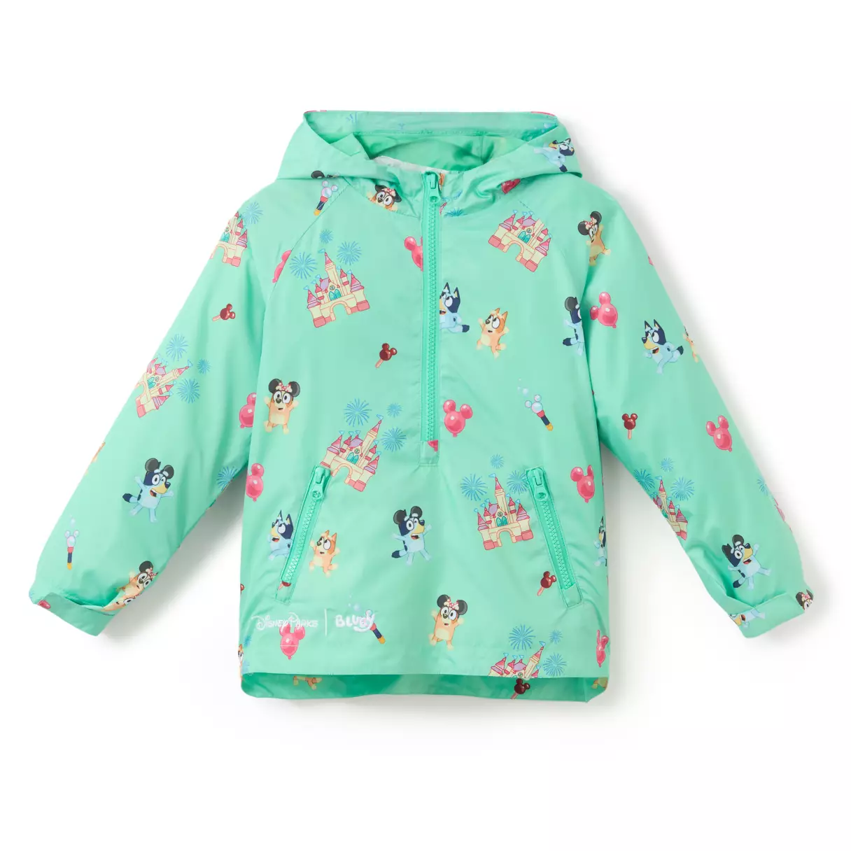 A teal, packable rain jacket, this item is patterned with Disney Parks iconography as well as images of Bingo and Bluey enjoying a day at the park. Both sisters can be seen in different poses, including wearing Mickey Mouse ears. We also see Fantasyland Castles and Mickey balloons.