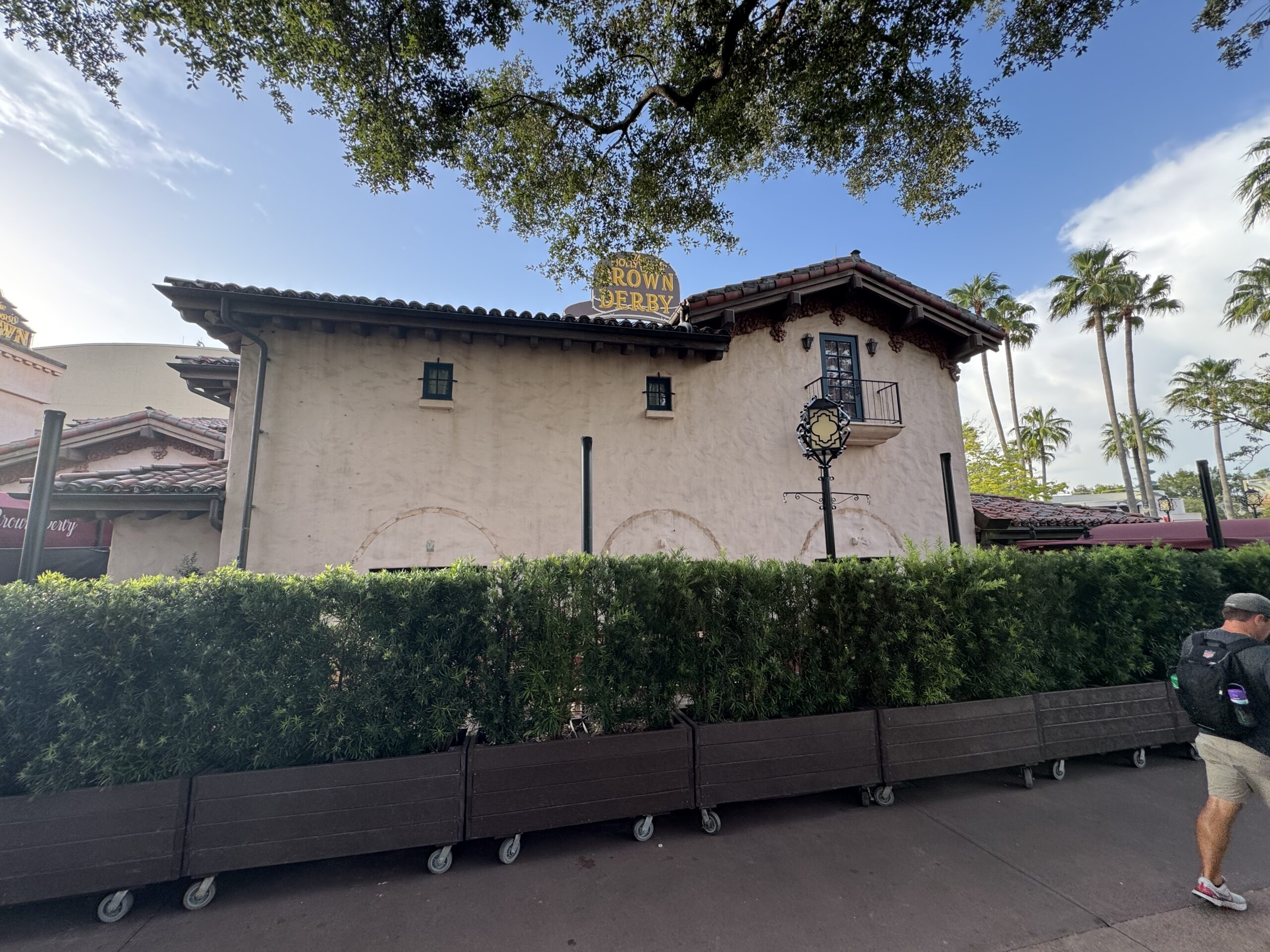 We can see that multiple supports have been installed on the patio, further supporting the rumor that Cast Members told us last month that a large shade structure is being installed over the area. In the past, umbrellas have shaded the area, as seen below: