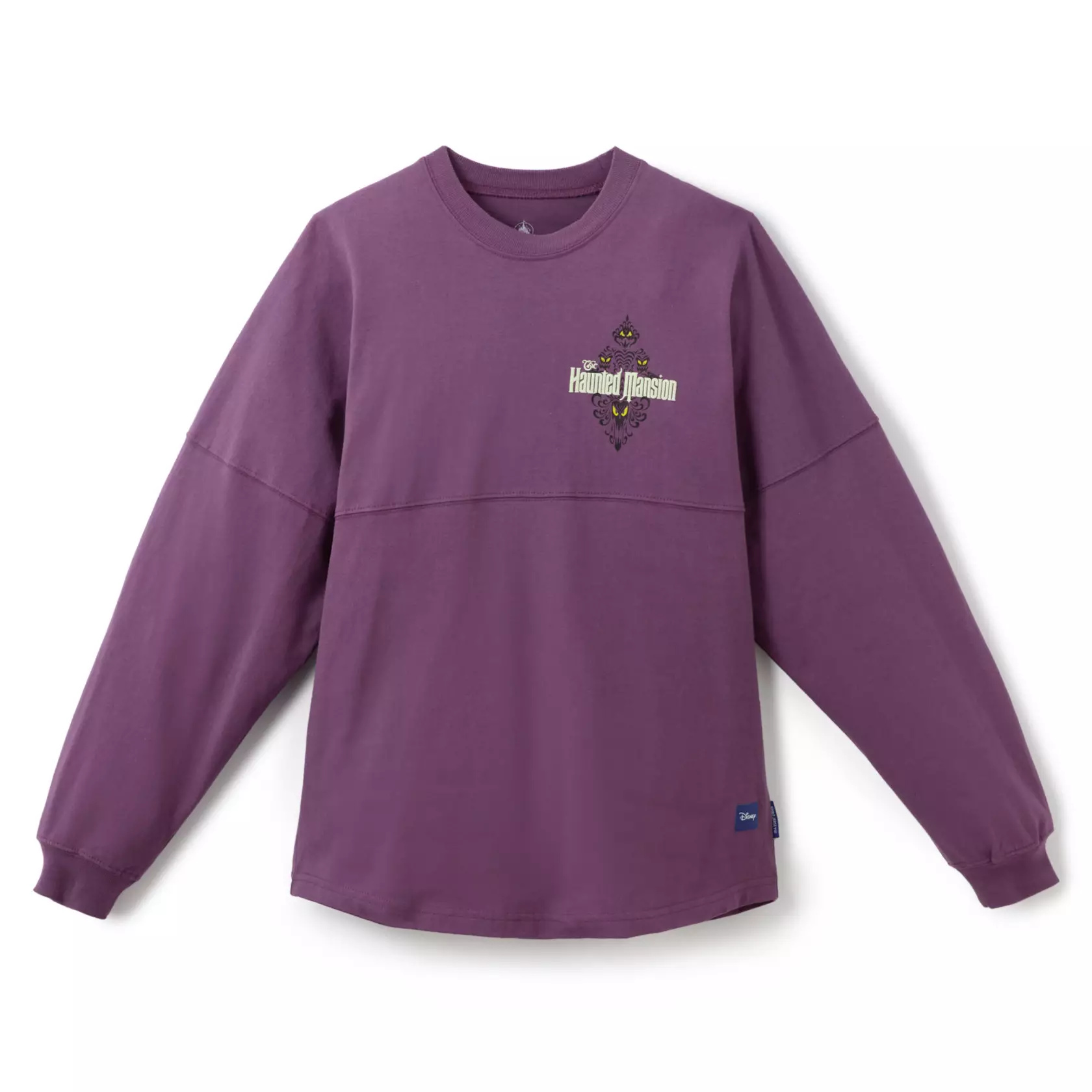 This purple cotton jersey features a section of the ride's famous damask wallpaper on the left chest with "The Haunted Mansion." Across the back is the ride's name in larger letters. The designs on the front and back both glow green in the dark.