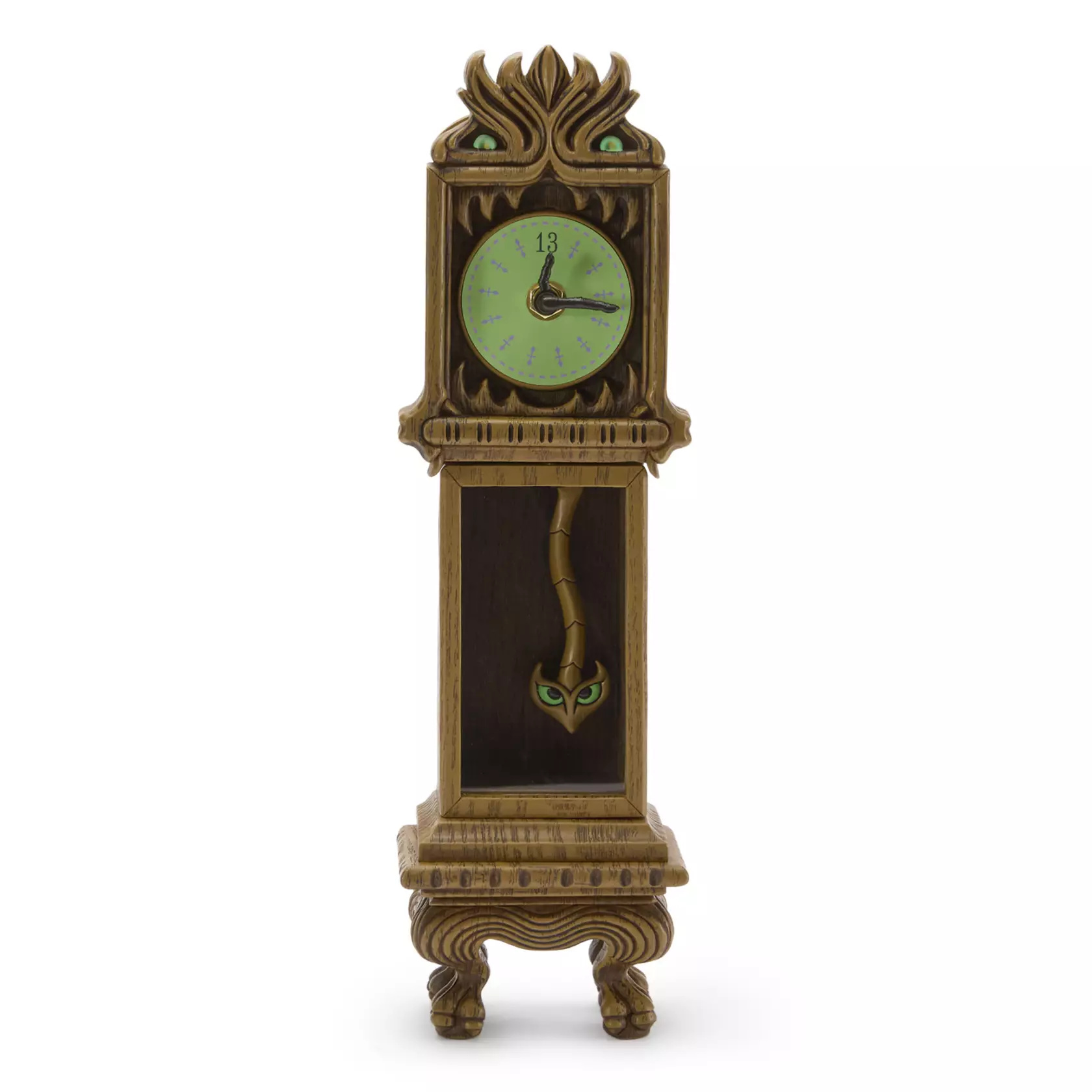 This 13.5" grandfather clock features monstrous details like green eyes and sharp teeth. The eyes and clock face glow in the dark. The clock hands actually move and the pendulum swings back and forth.