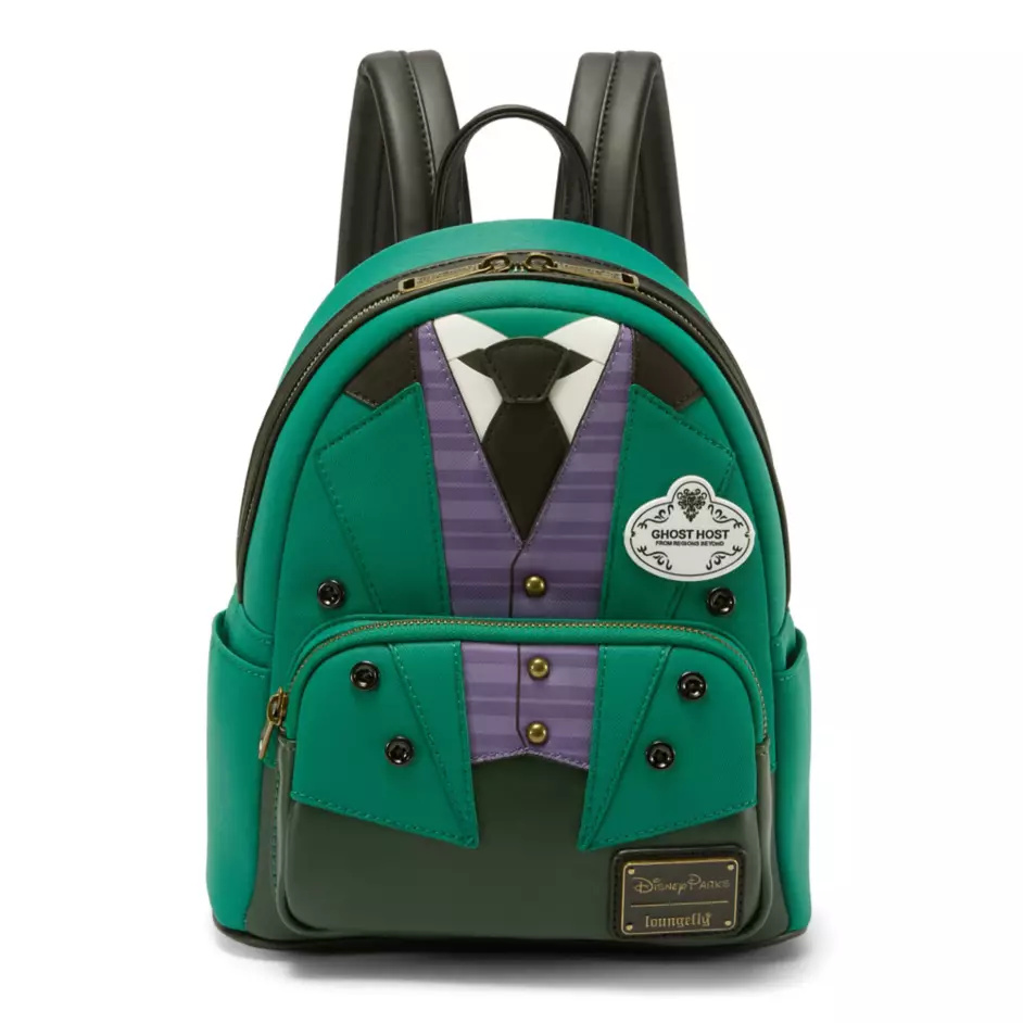 This backpack is inspired by the butler costumes worn by Haunted Mansion Cast Members. Appliqués and button details create the look of a green jacket over a purple striped waistcoat, black tie, white shirt, and dark green pants. A nametag on the front features wallpaper-inspired filigree around "Ghost Host - From Regions Beyond."