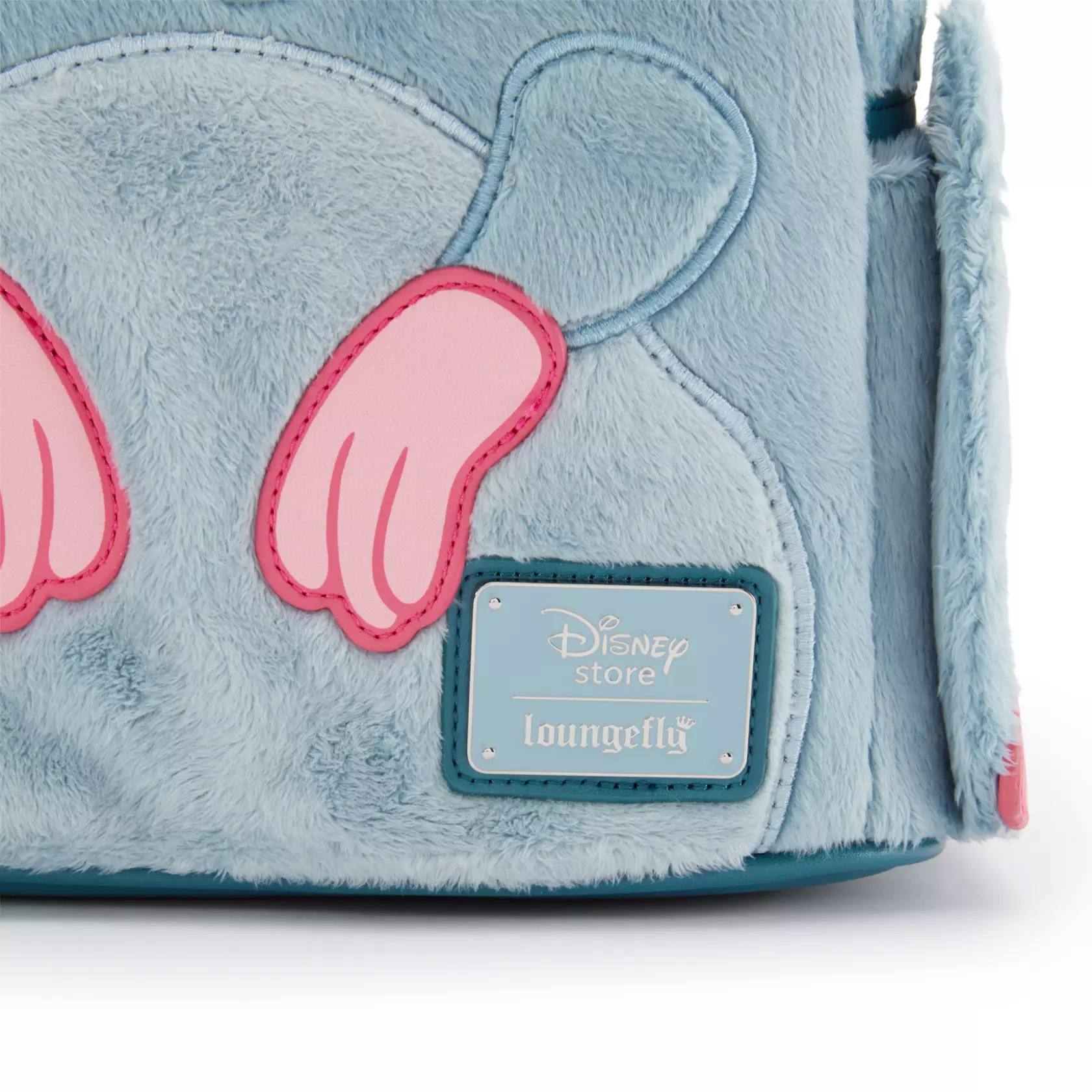 A Remy Plush Loungefly Mini Backpack is now available online, so you can now wear him on your back.
