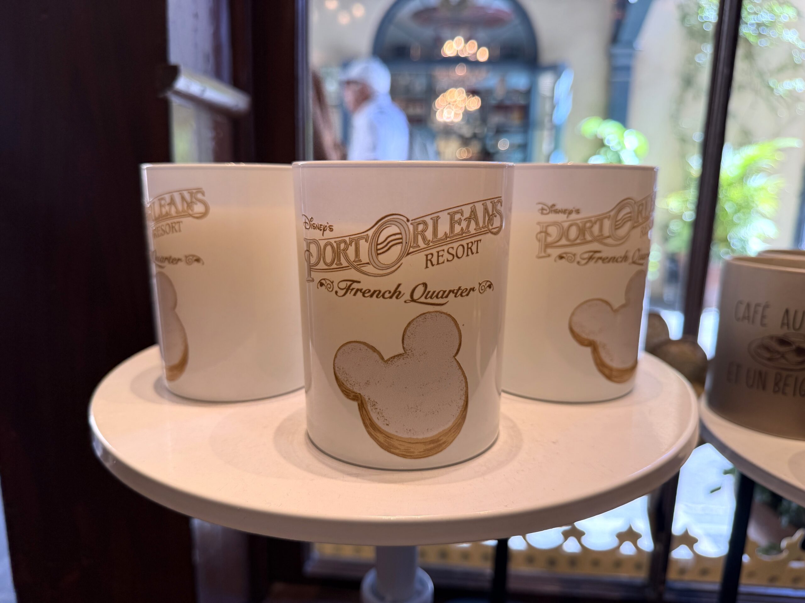 This beignet-scented candle is pretty close to the real thing! This candle, which features a beignet and the wordmark for Port Orleans - French Quarter, is inspired by the signature scent of the resort.