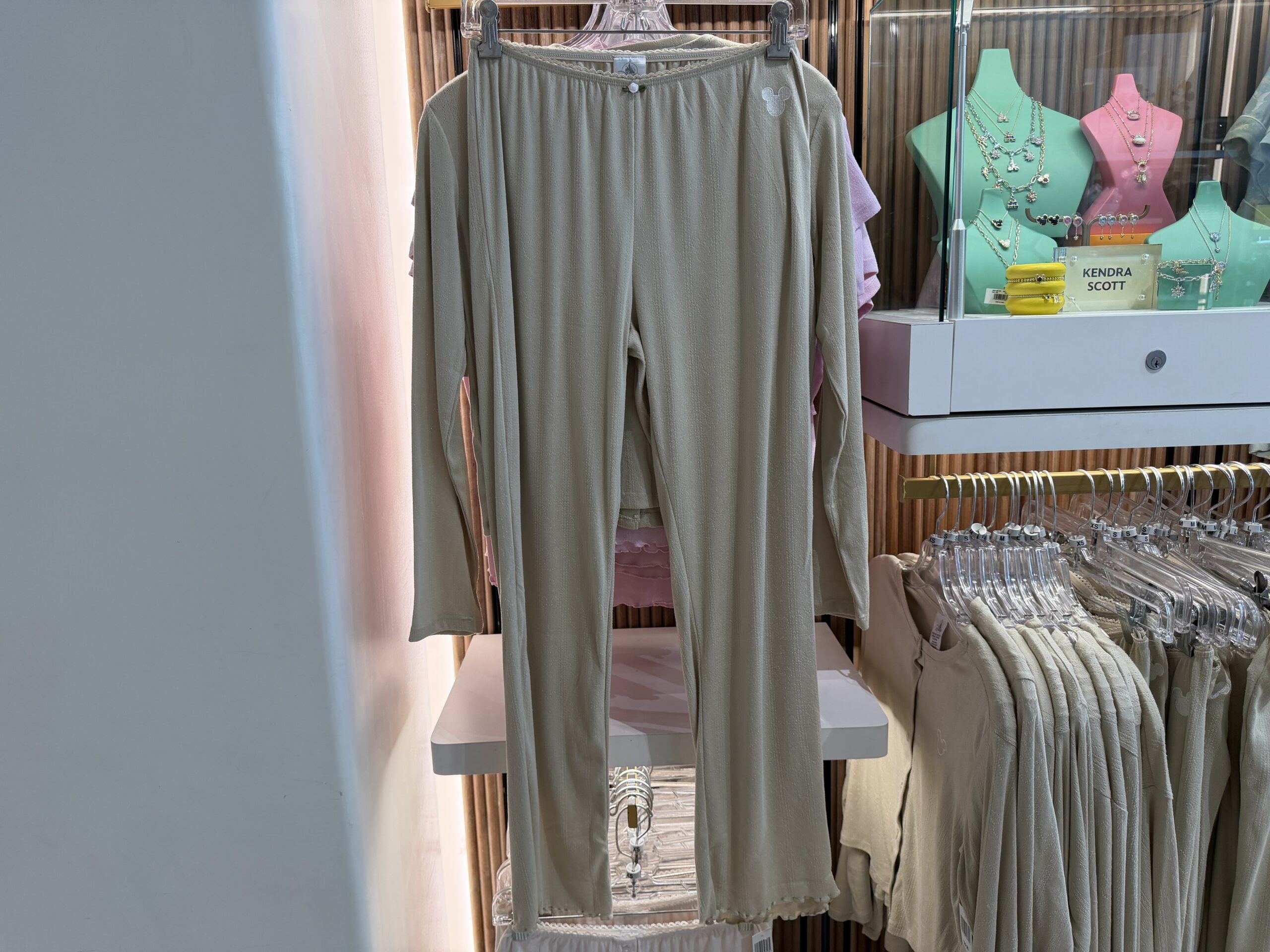 This two-piece set is the same as the one above but in a tan color and with long sleeves and pants,