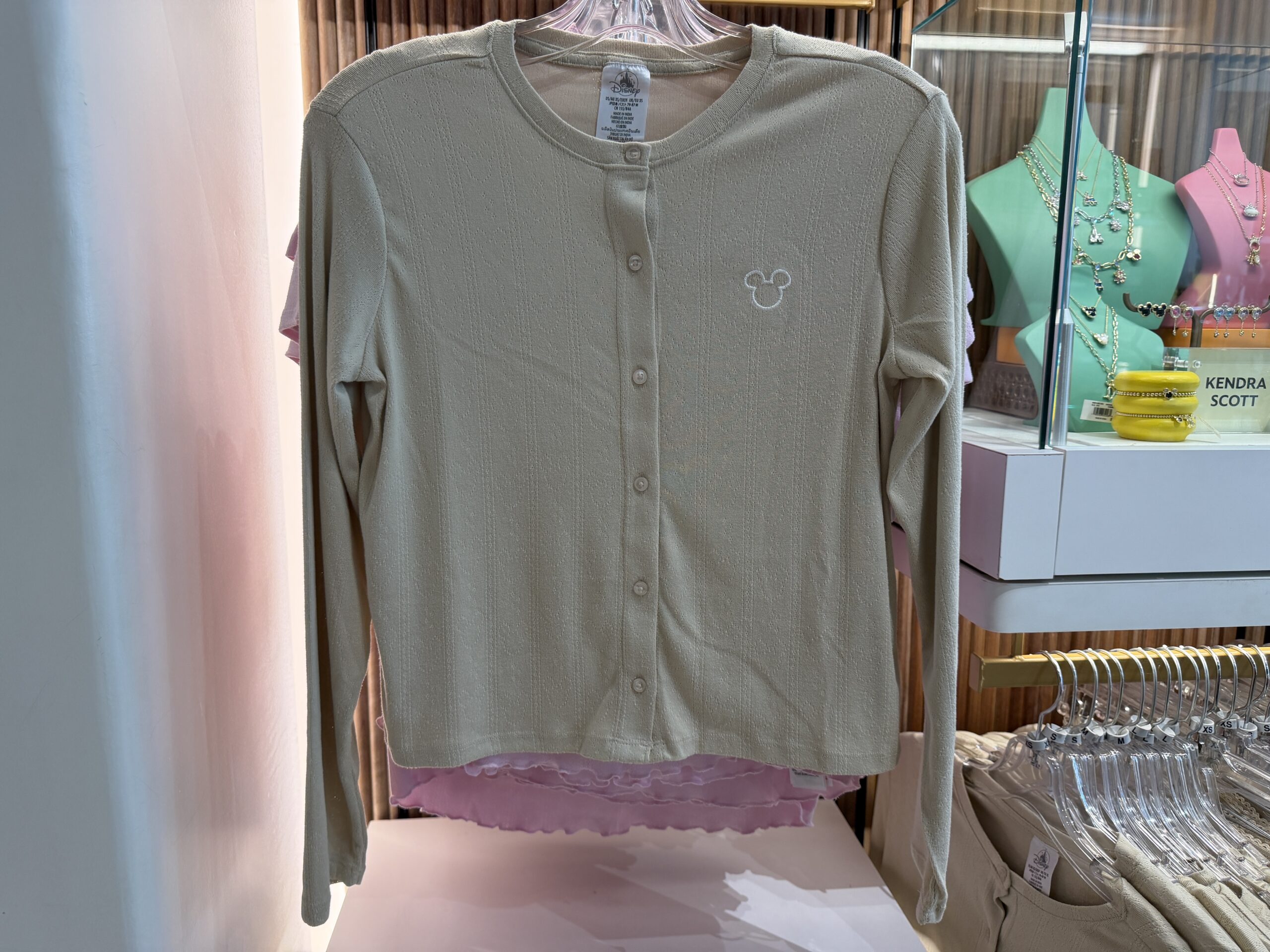 This two-piece set is the same as the one above but in a tan color and with long sleeves and pants,
