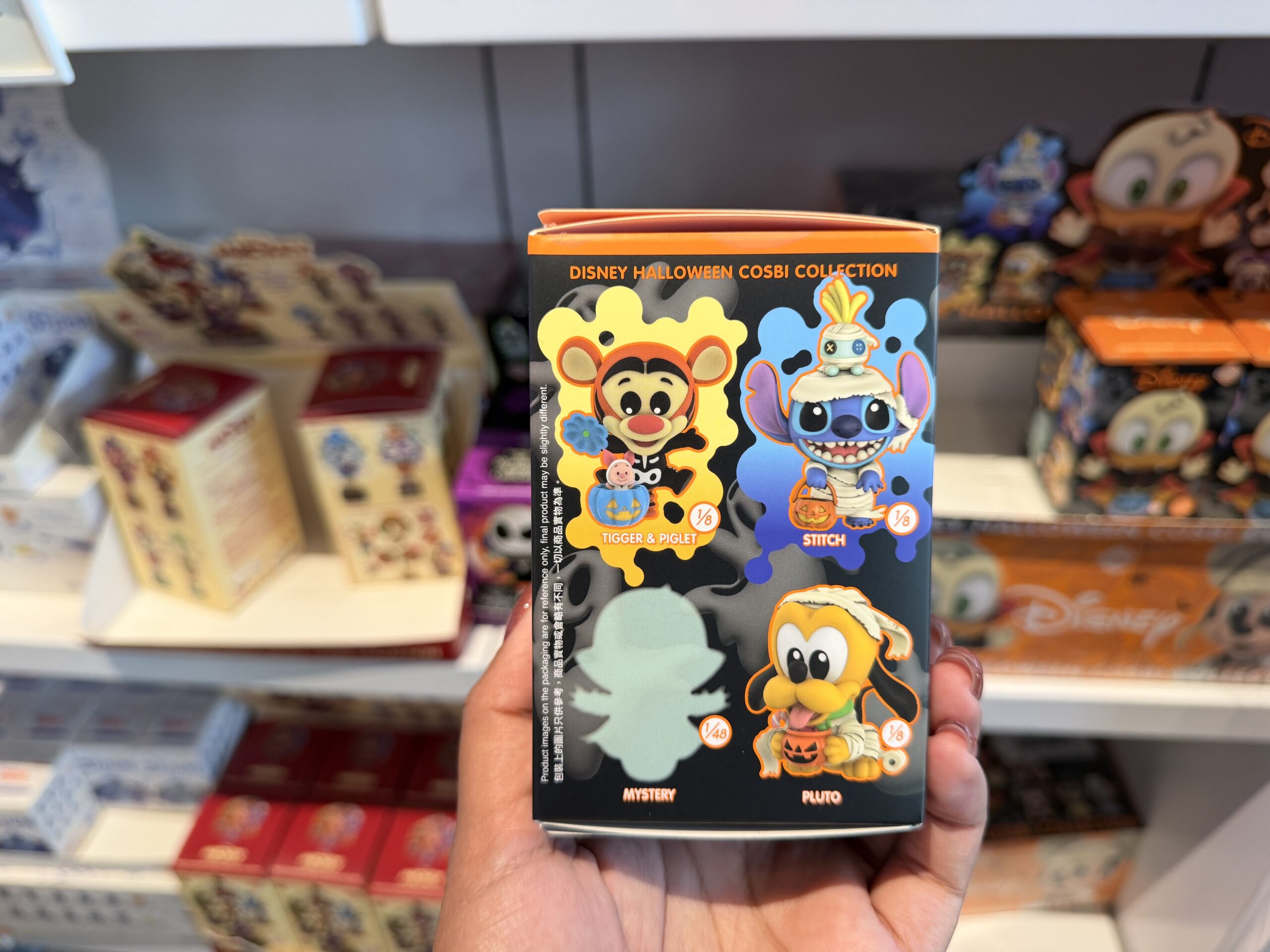 Eight different Halloween versions of favorite Disney characters are available in this mystery figure set.