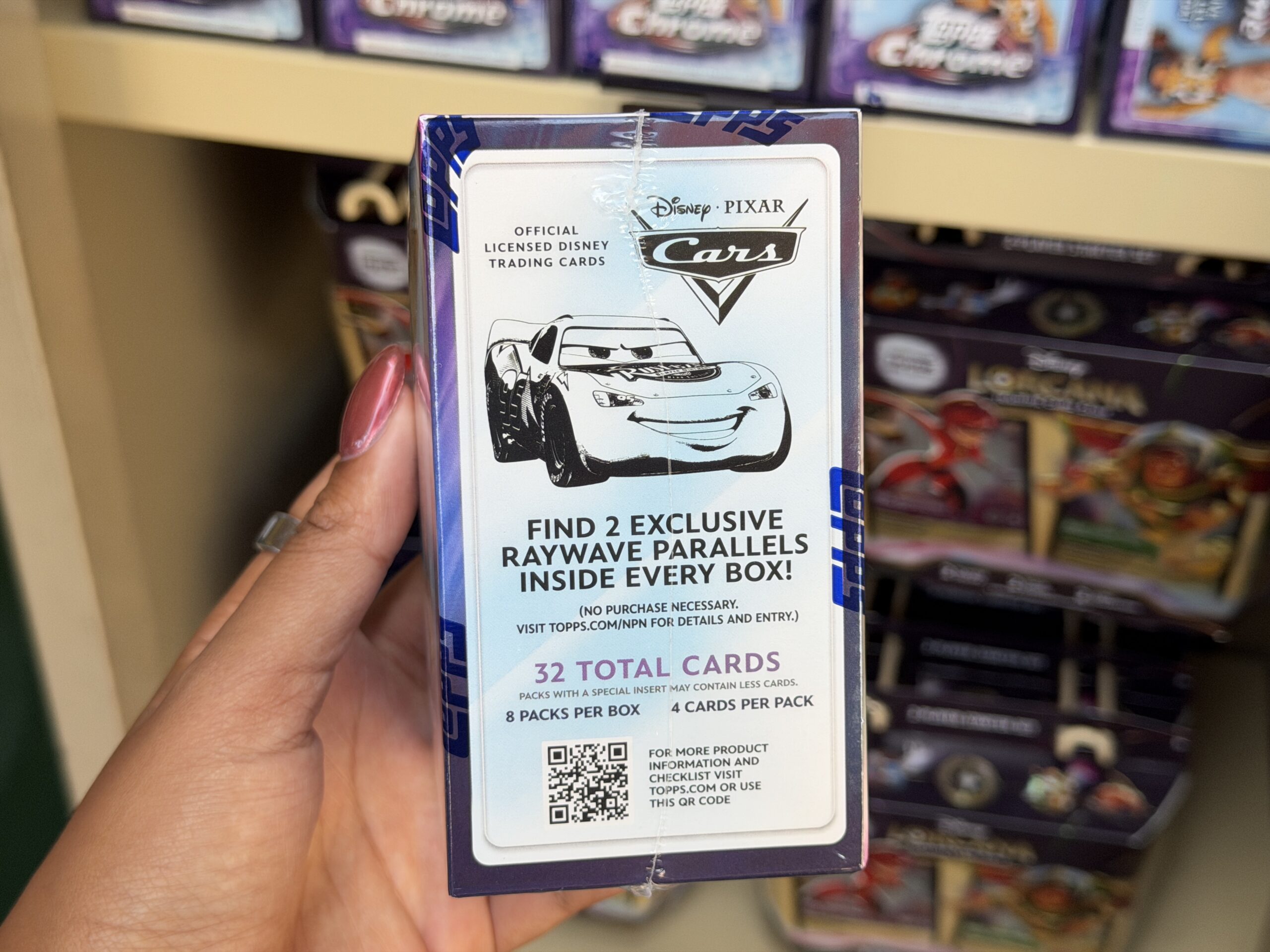 New Topps Chrome sets at Disneyland features cards from Toy Story, Moana, High School Musical, and more.