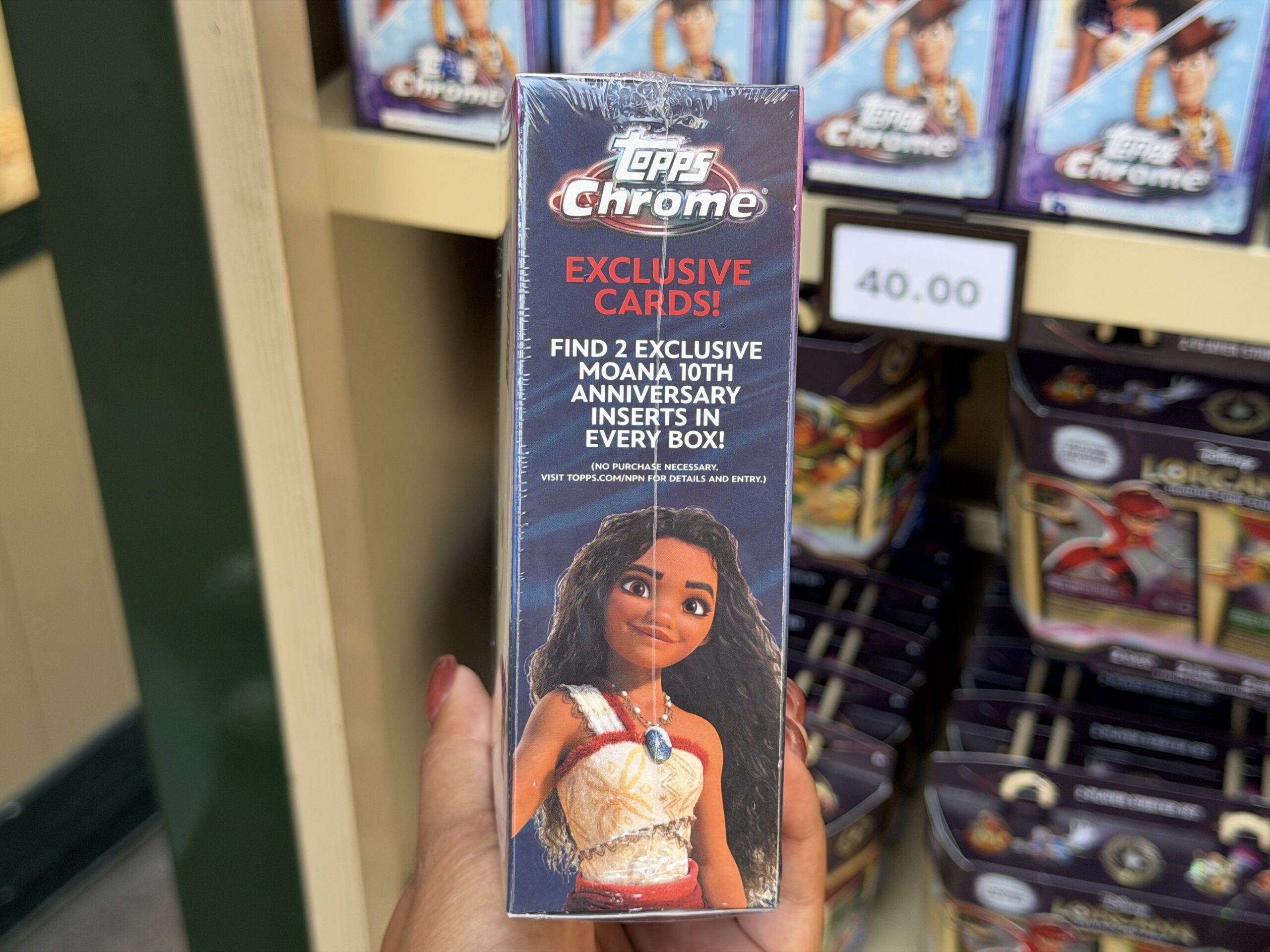 New Topps Chrome sets at Disneyland features cards from Toy Story, Moana, High School Musical, and more.