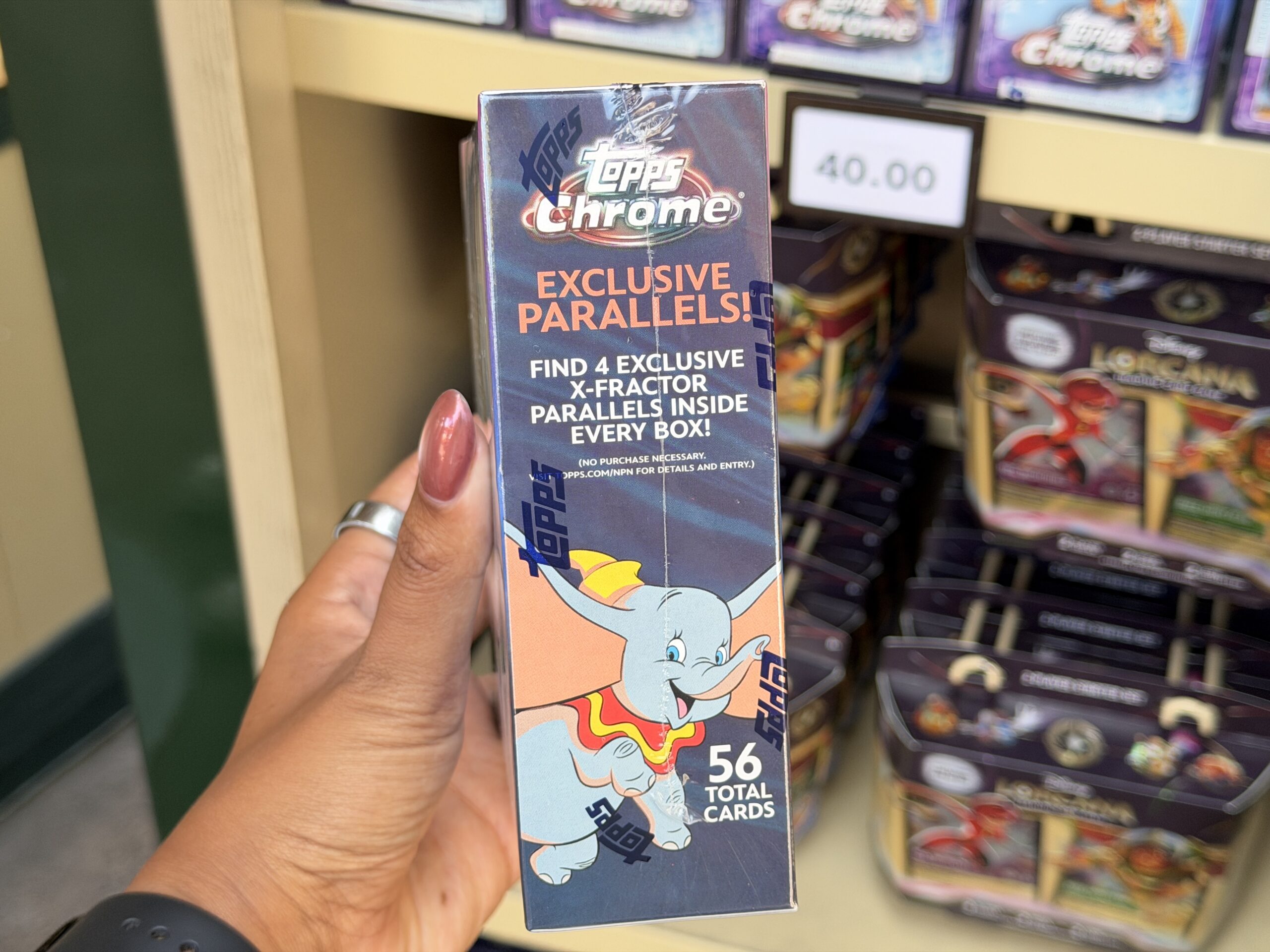 New Topps Chrome sets at Disneyland features cards from Toy Story, Moana, High School Musical, and more.
