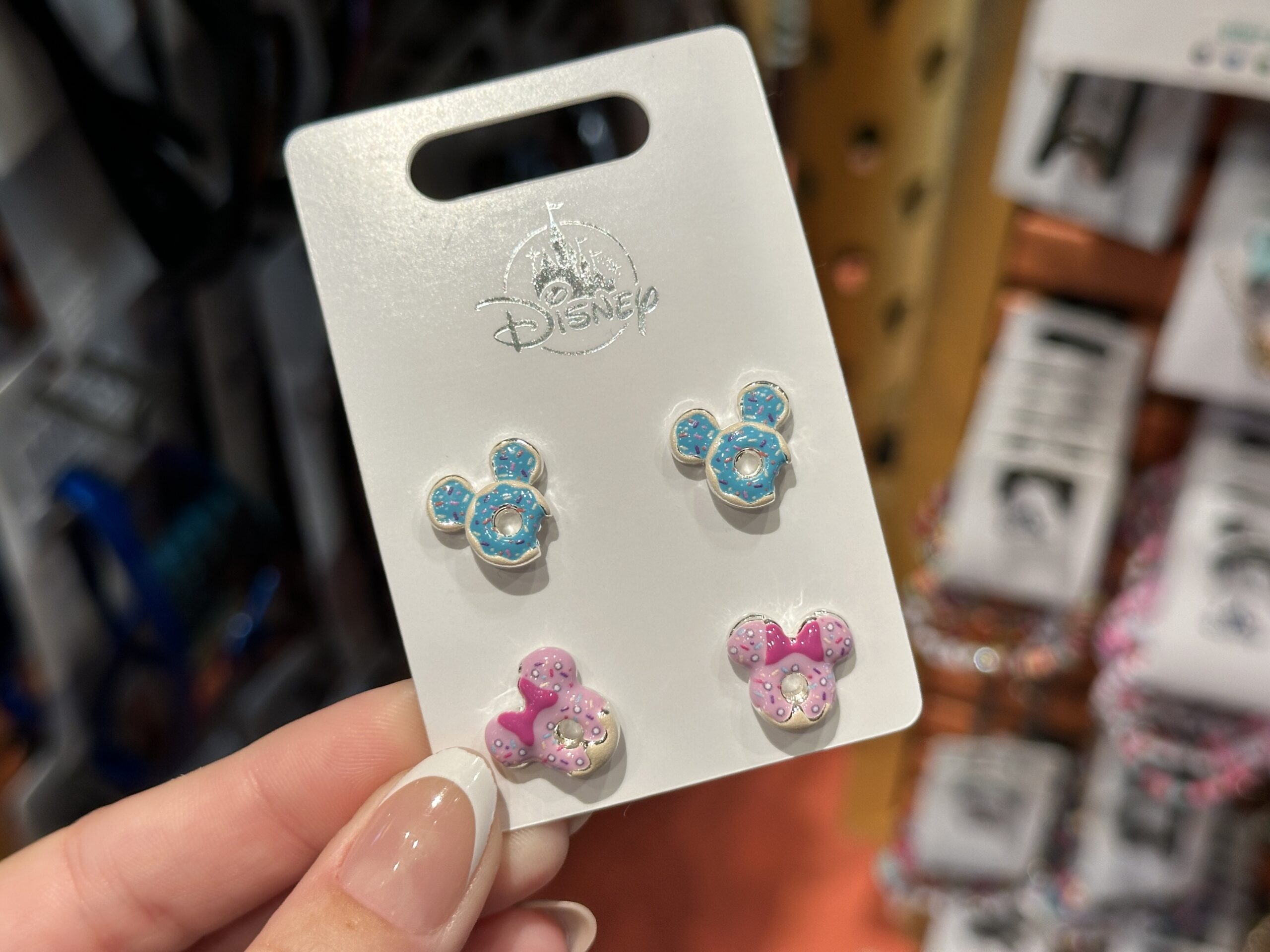 In the same aesthetic, these Mickey and Minnie character icons are also donut-shaped and are two pairs of earrings.