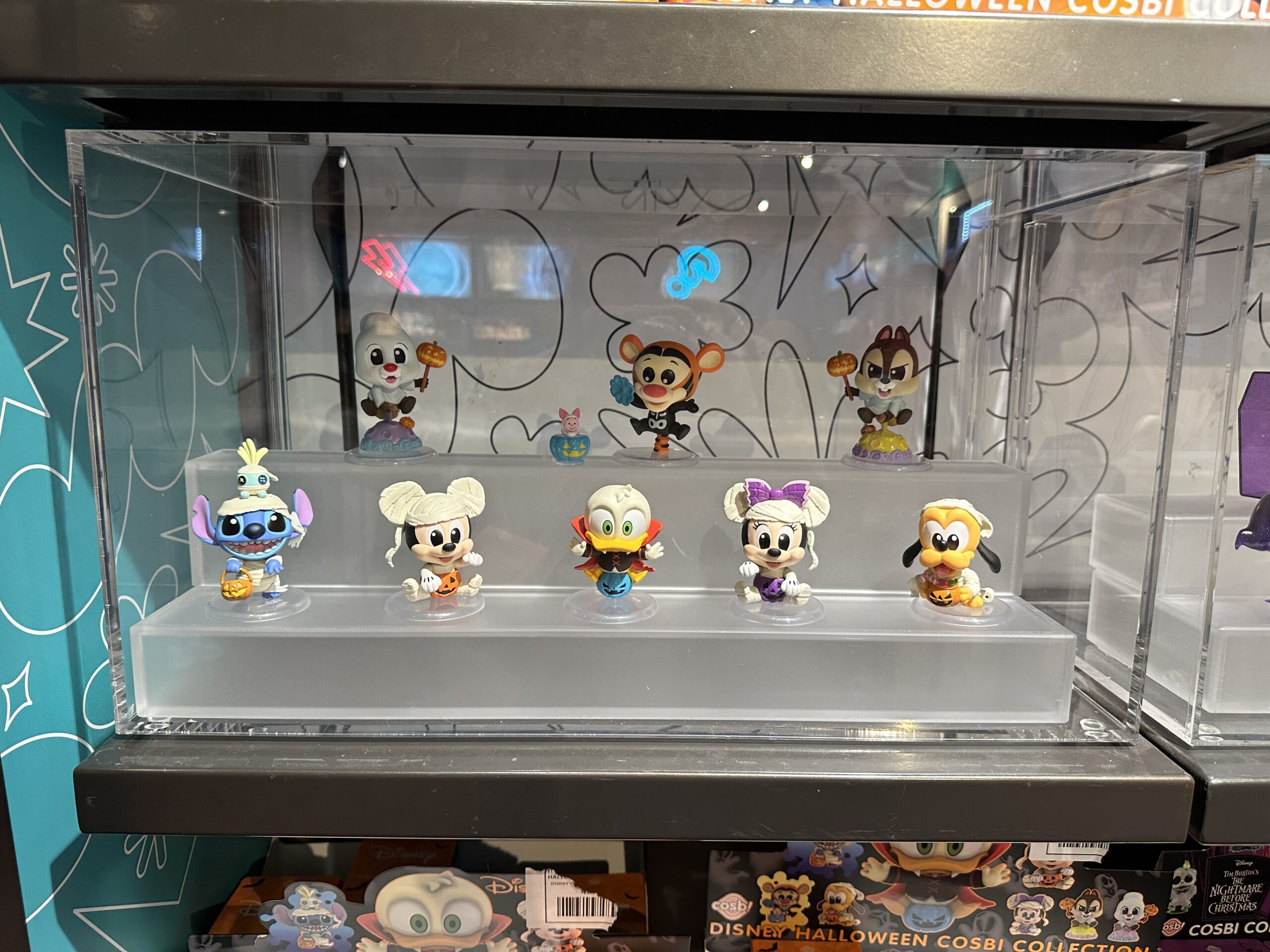 Eight different Halloween versions of favorite Disney characters are available in this mystery figure set.