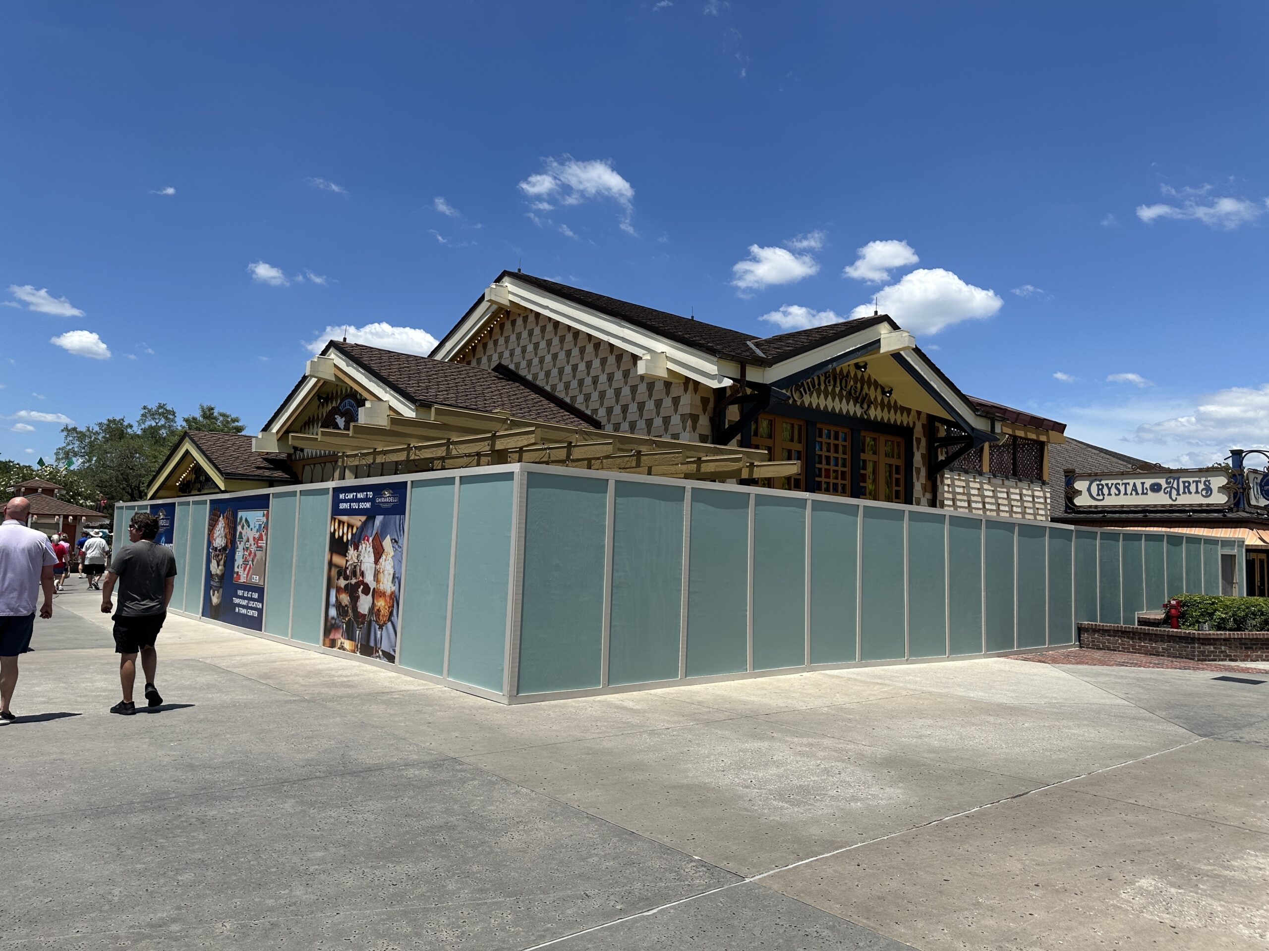 Ghiradelli Soda Fountain & Chocolate Shop is currently closed for refurbishment at Disney Springs. Aqua walls are now around the building.