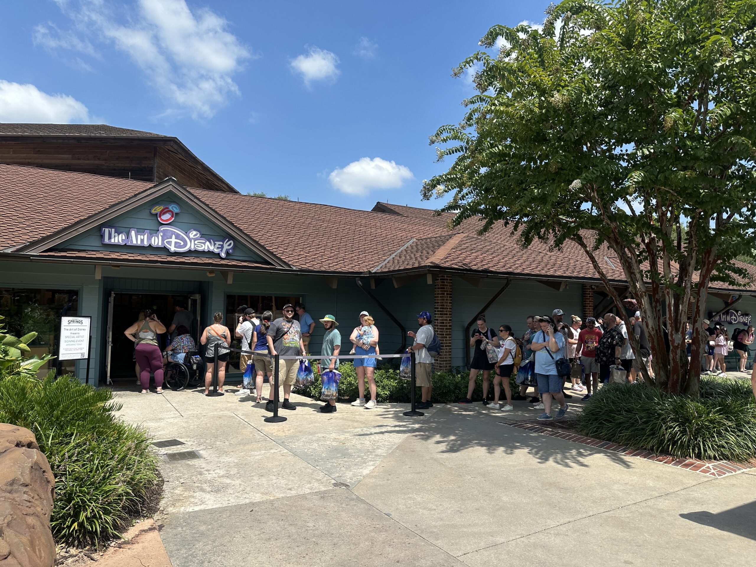 Guests who signed up for a virtual queue were able to meet with Lorcana artist Mike Parker to get their cards signed from 10 a.m. to 1 p.m. They were also able to receive a free Maleficent Magical Places promo card by visiting World of Disney.