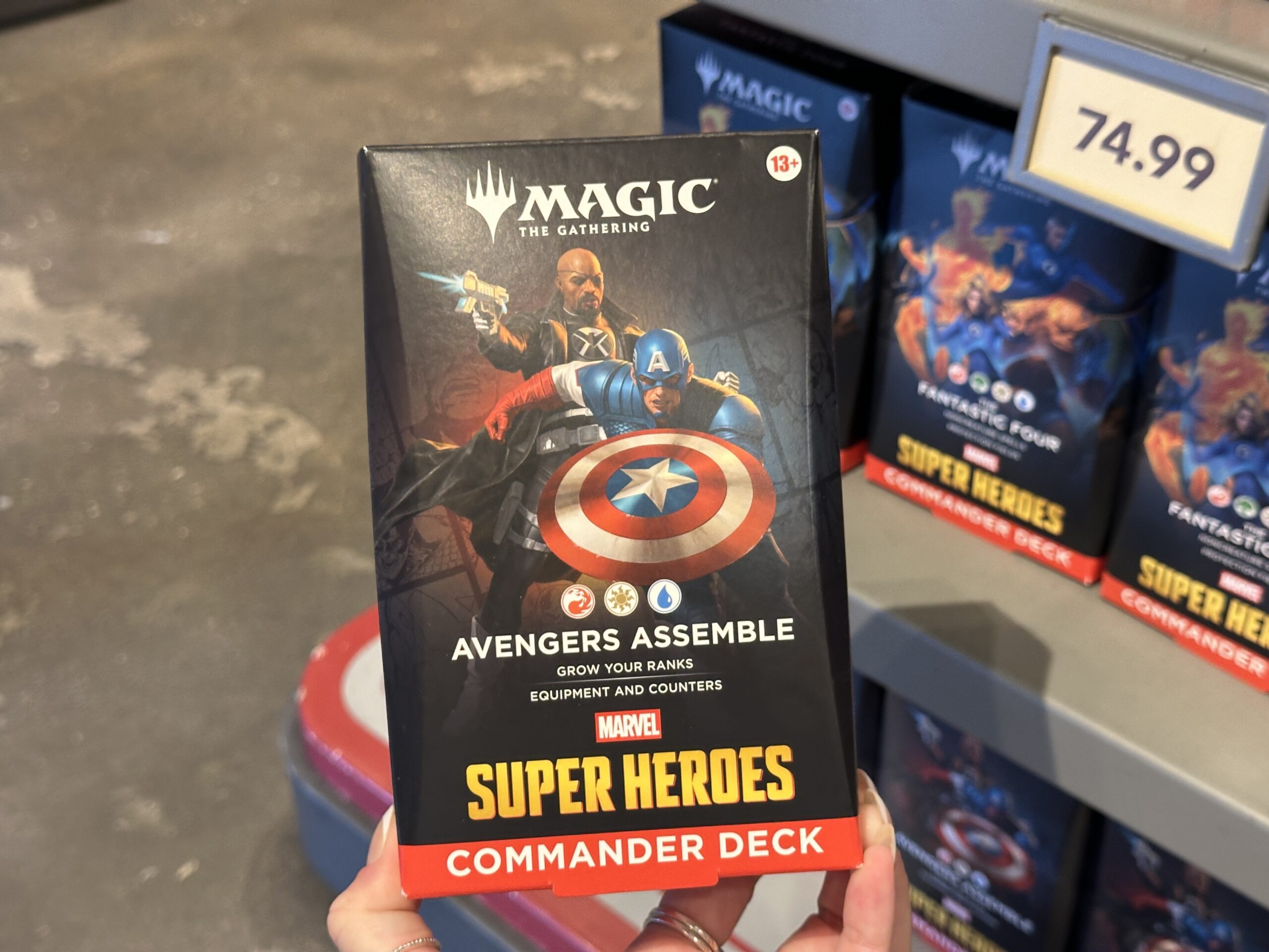 A commander deck focused on the Avengers. It comes with 100 cards that include 30 new cards as well as 10 double-sided token cards, a strategy insert, and a reference card.